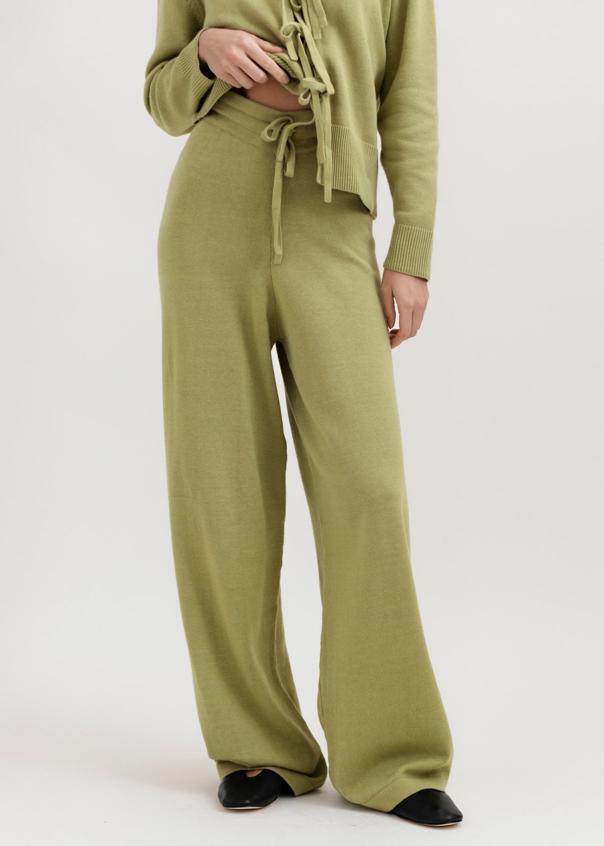 Alba Pants in Olive, cotton and baby alpaca wide-leg pants by Ahblo, worn by model