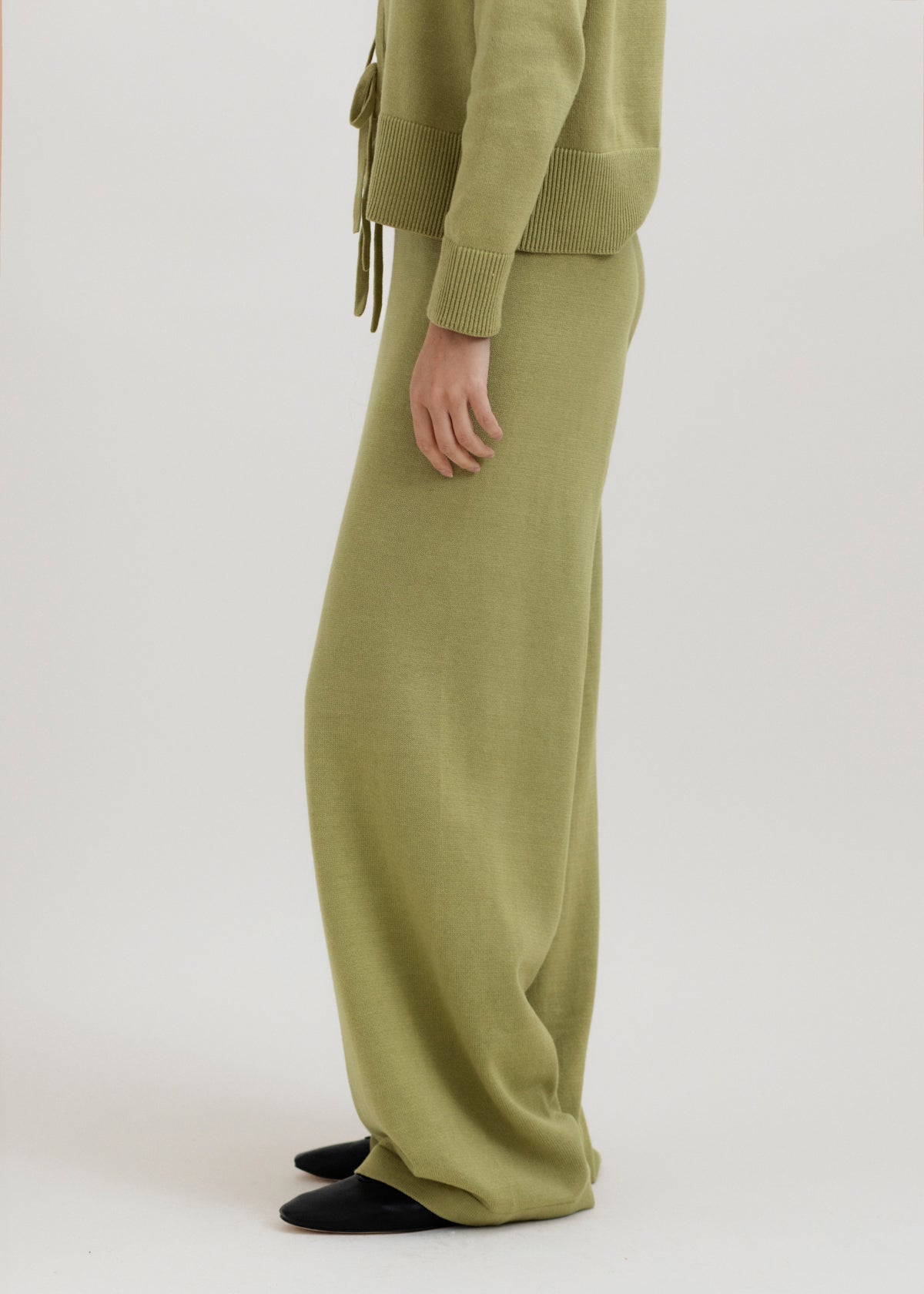 Alba Pants in Olive, cotton and baby alpaca wide-leg pants by Ahblo, worn by model