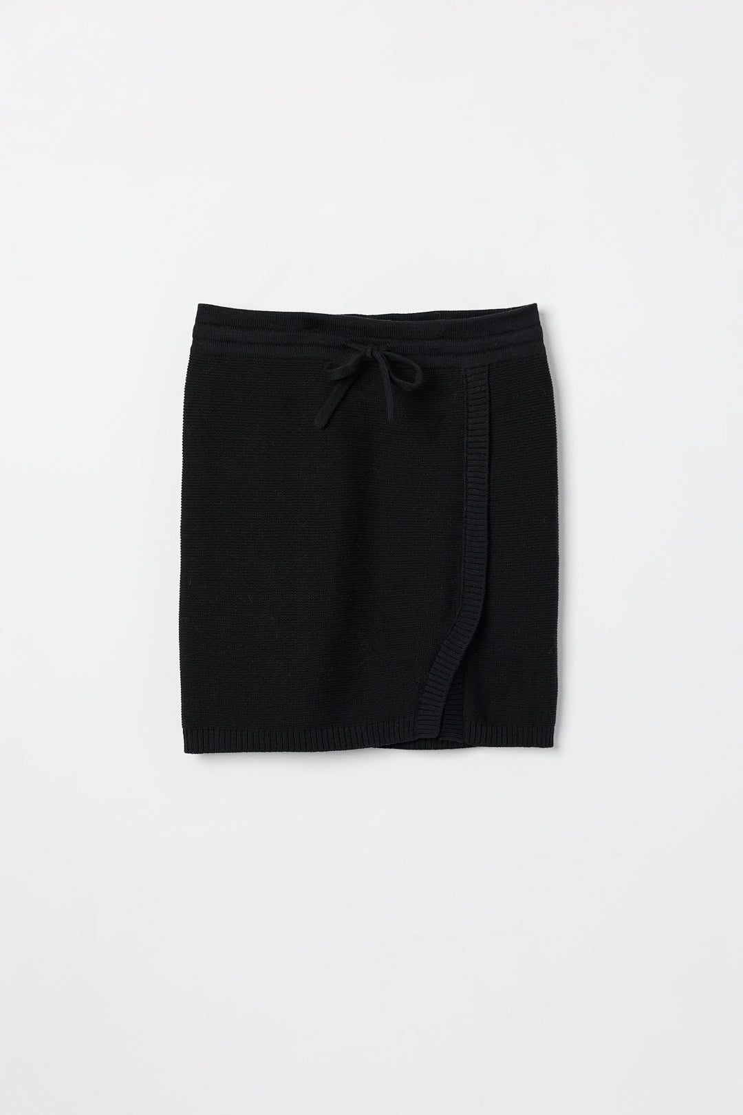Alin Mini Skirt in Black, cotton and baby alpaca mini skirt by Ahblo, flat lay