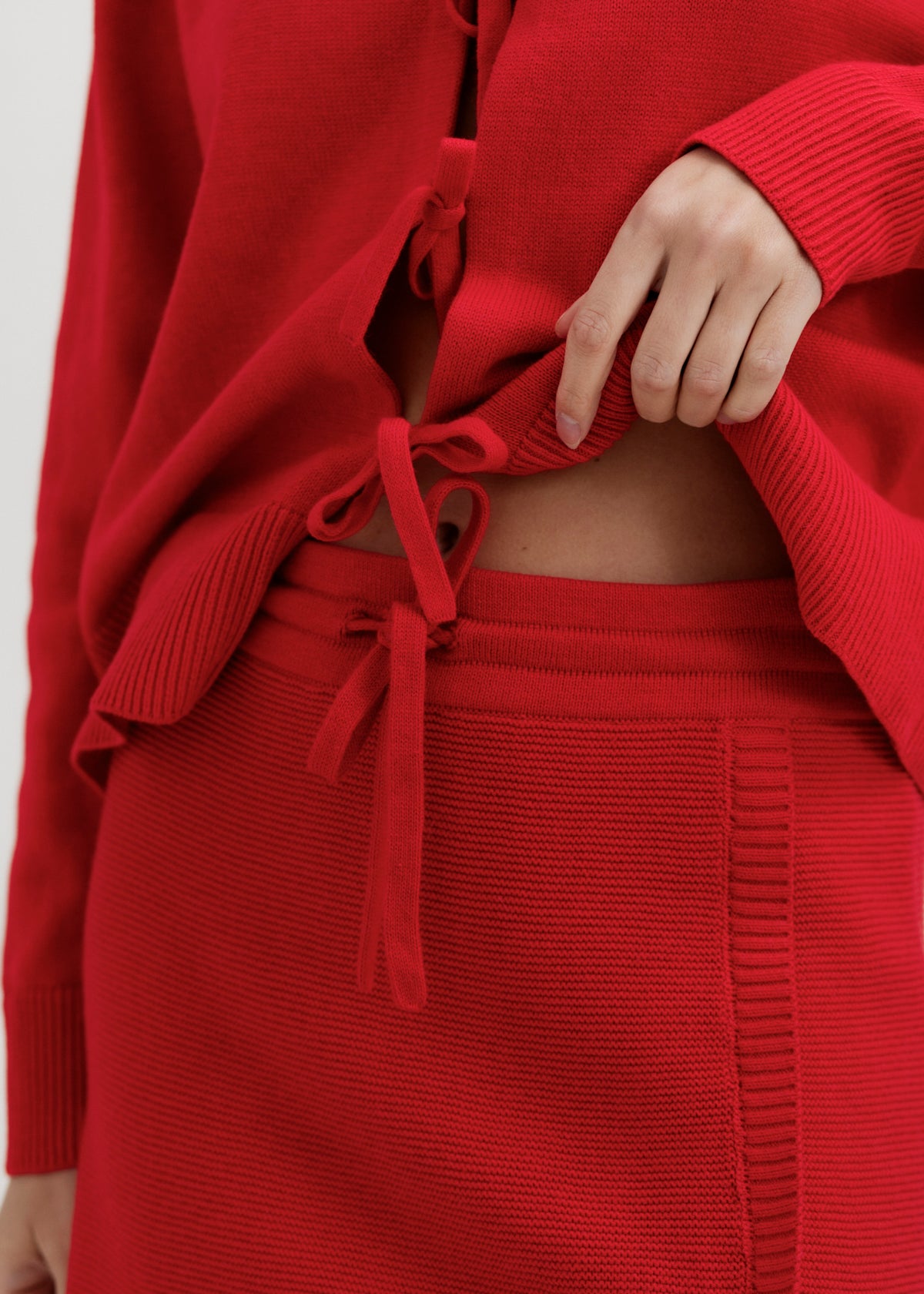 Alin Mini Skirt in Cerise, cotton and baby alpaca mini skirt by Ahblo, worn by model