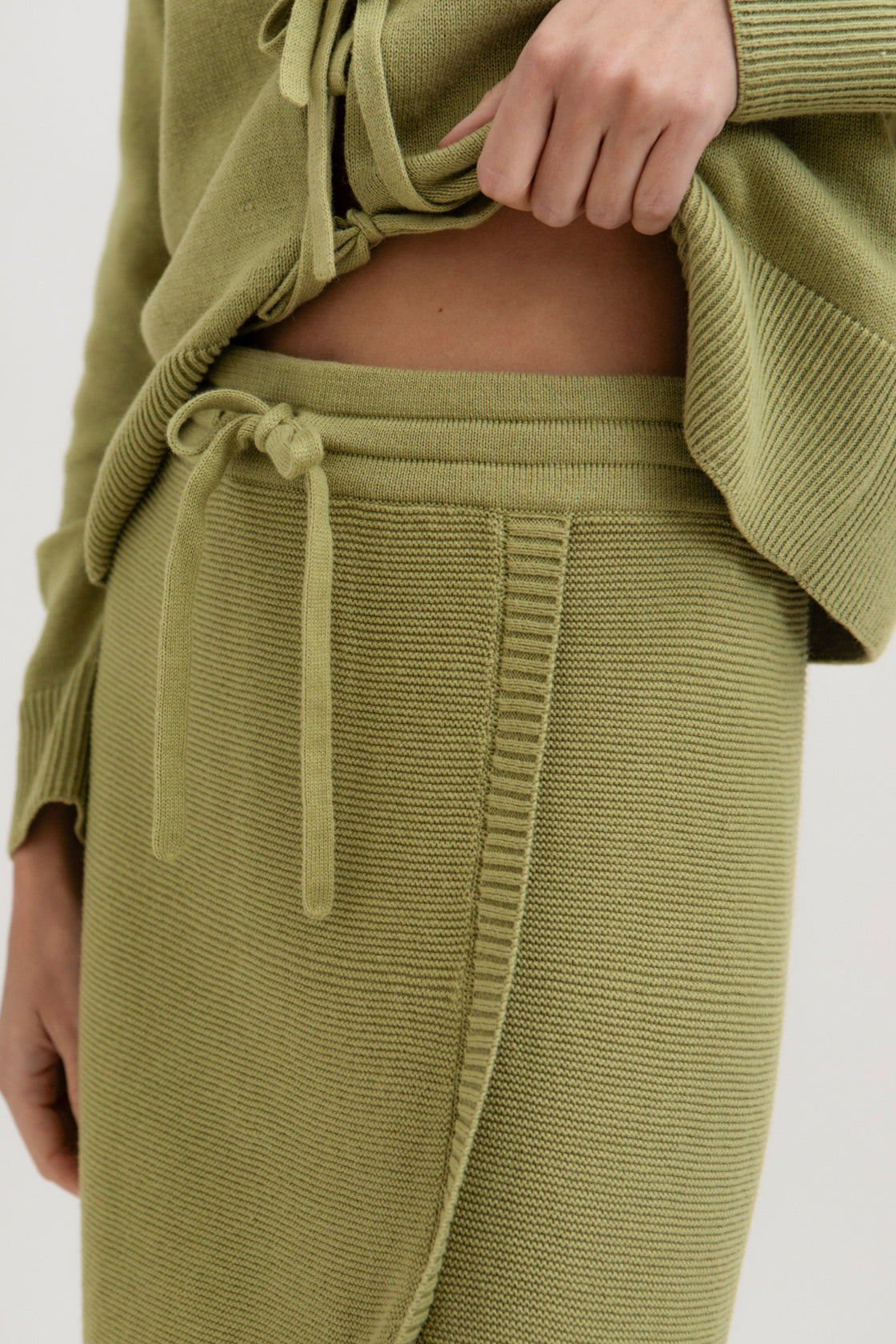Alin Mini Skirt in Olive, cotton and baby alpaca mini skirt by Ahblo, worn by model