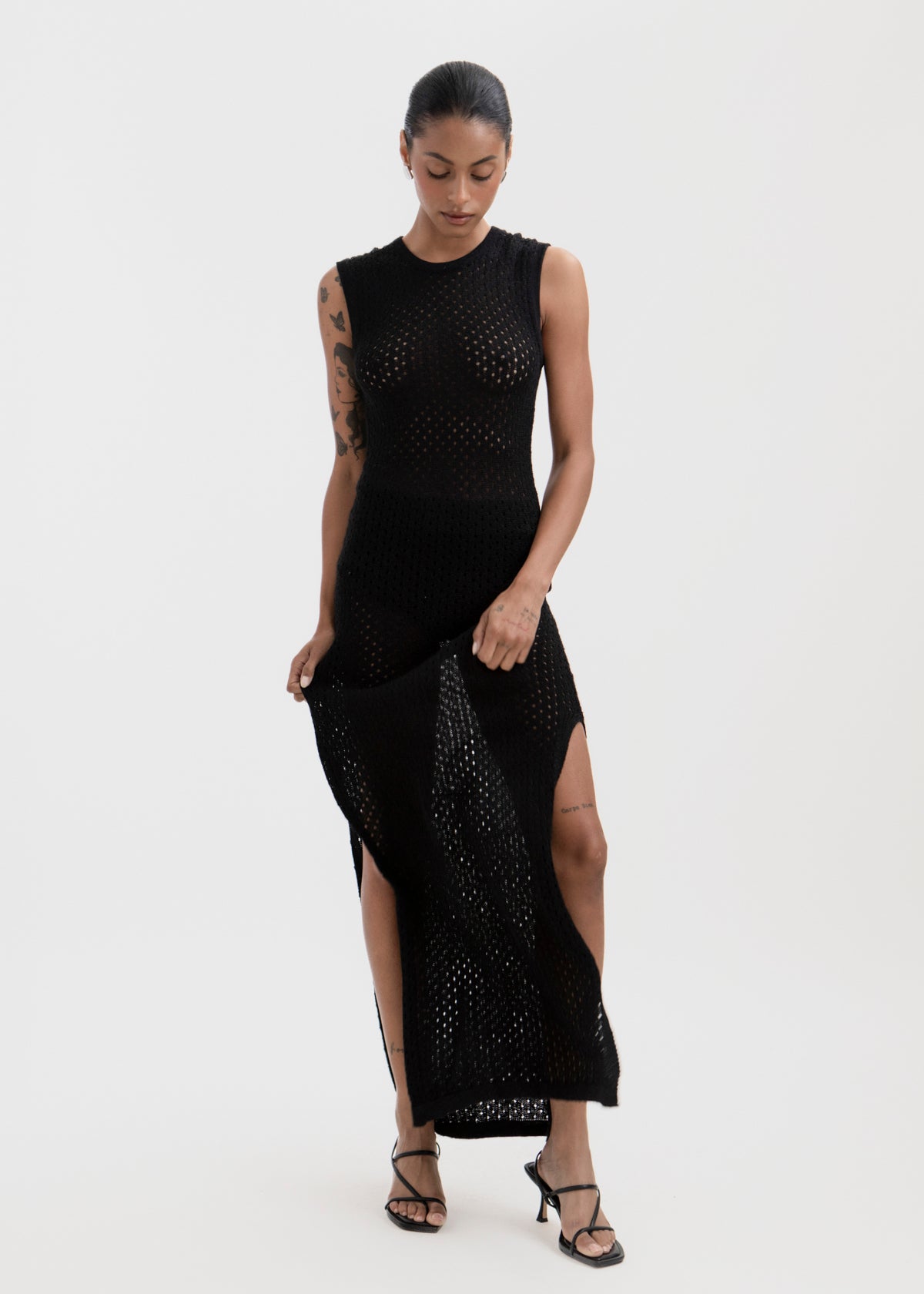 Aurora Dress in Black, baby alpaca knit maxi dress by Ahblo, worn by model