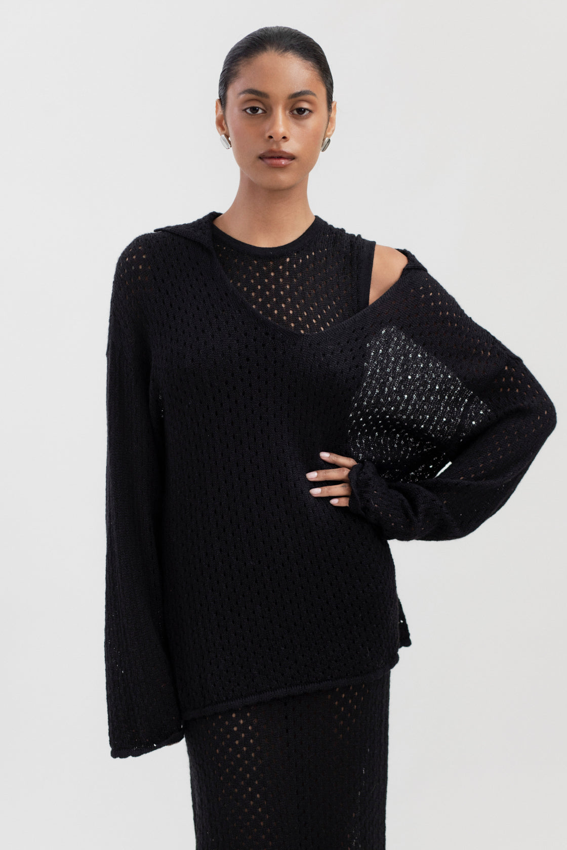 Aurora Dress in Black, baby alpaca knit maxi dress by Ahblo, worn by model