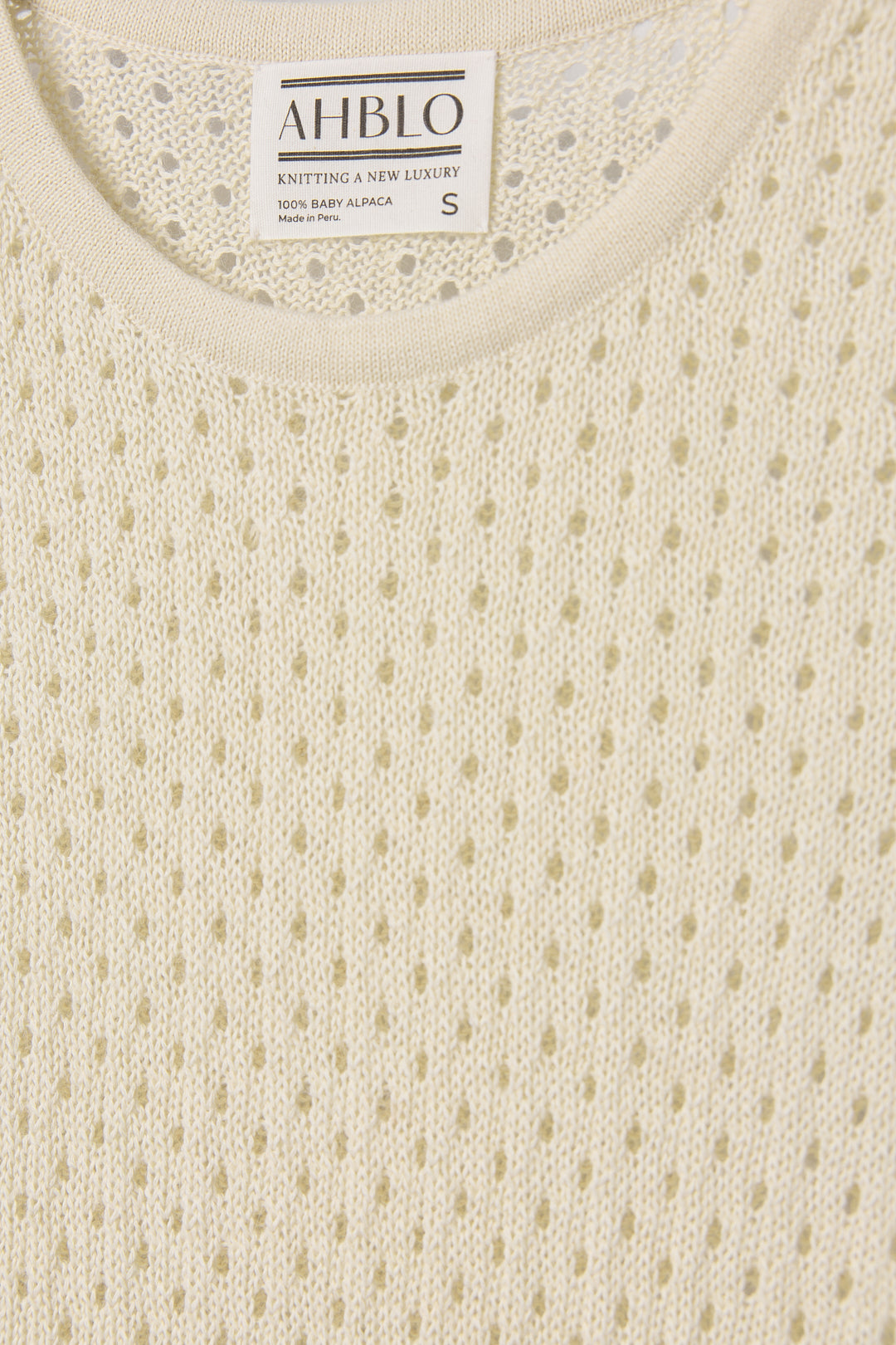Aurora Dress in Cream, baby alpaca knit maxi dress by Ahblo, flat lay
