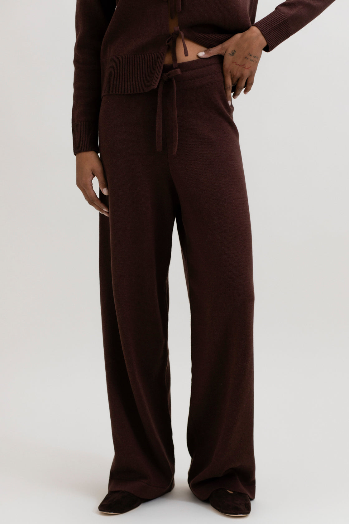 Avery Trousers in Chocolate Brown, baby alpaca wide-leg knit trousers by Ahblo, worn by model
