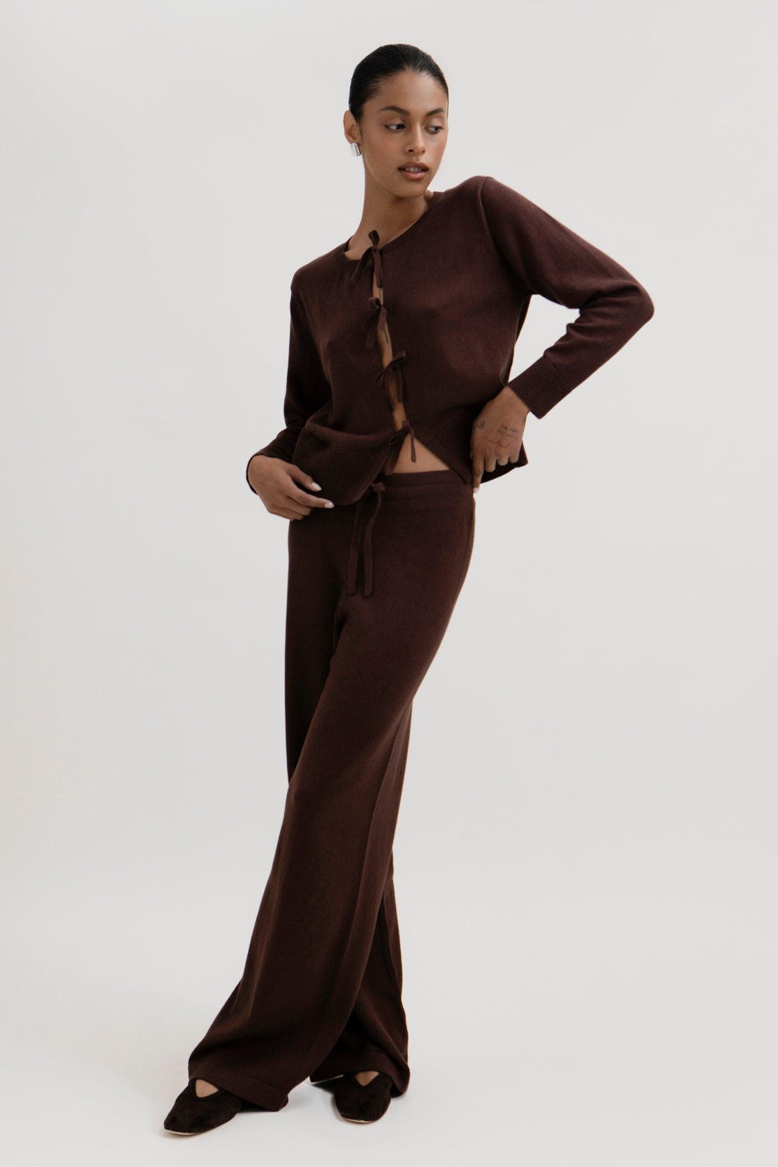 Avery Trousers in Chocolate Brown, baby alpaca wide-leg knit trousers by Ahblo, worn by model