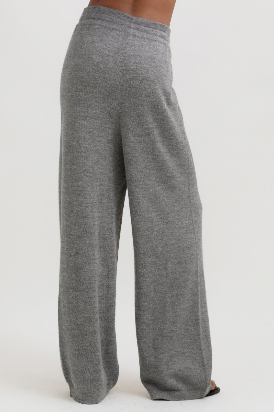Avery Trousers in Mist Grey, baby alpaca wide-leg knit trousers by Ahblo, worn by model