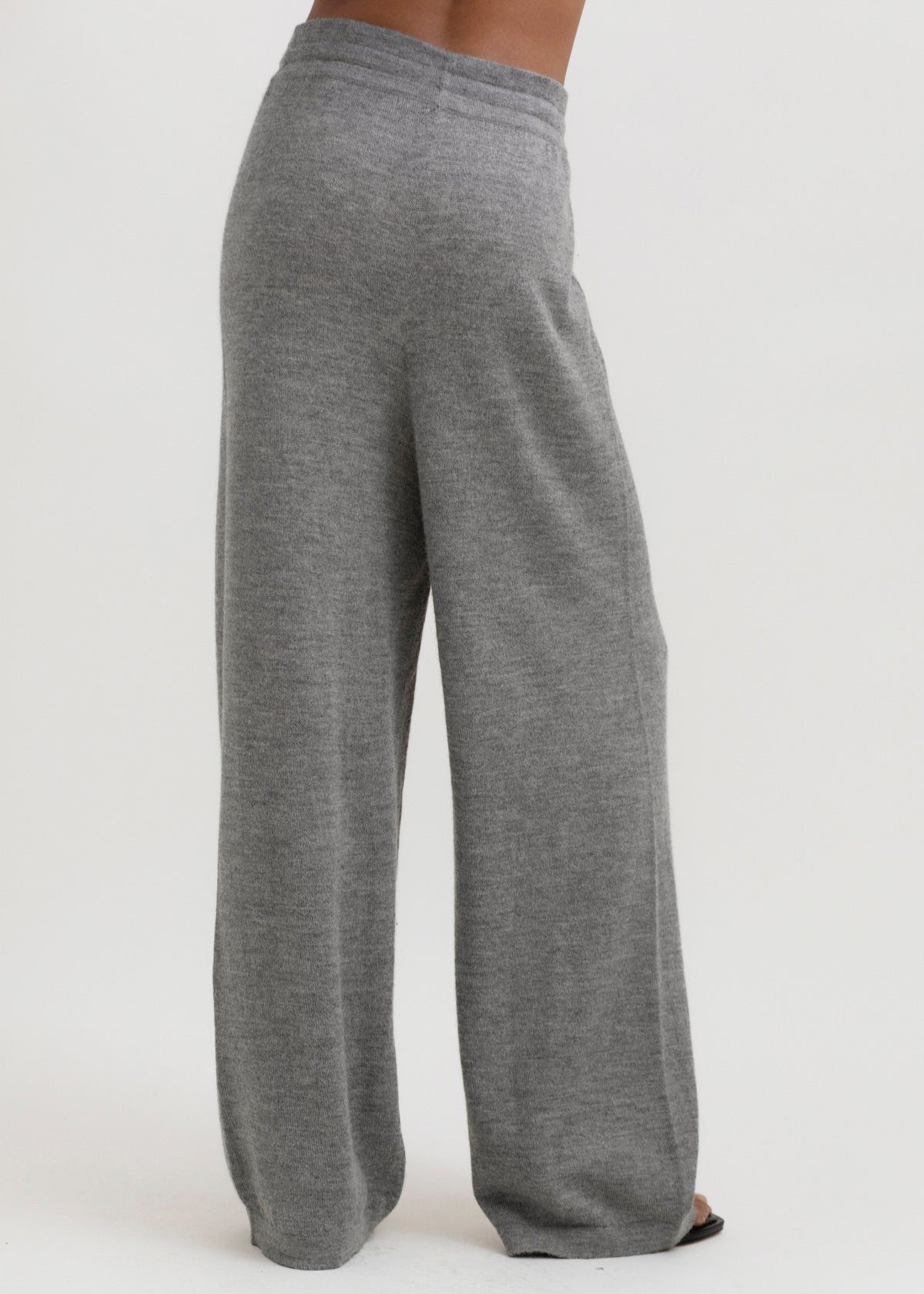 Avery Trousers in Mist Grey, baby alpaca wide-leg knit trousers by Ahblo, worn by model