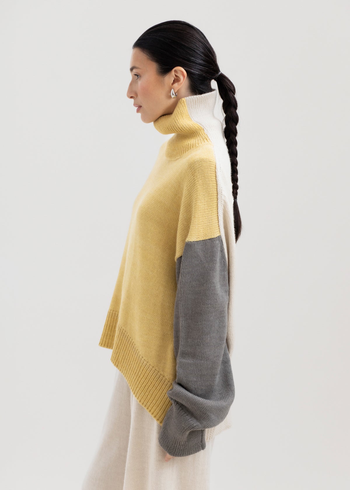 Cedar Colorblock Sweater in Buttercream Mix, oversized baby alpaca colorblock turtleneck sweater by Ahblo, worn by model
