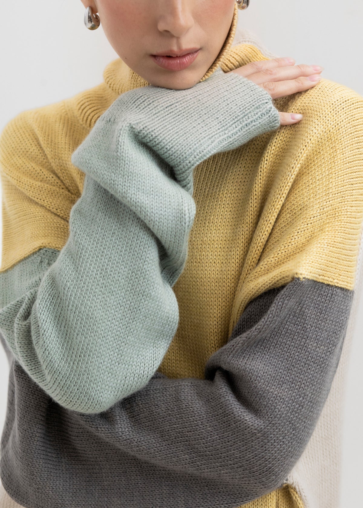 Cedar Colorblock Sweater in Buttercream Mix, oversized baby alpaca colorblock turtleneck sweater by Ahblo, worn by model