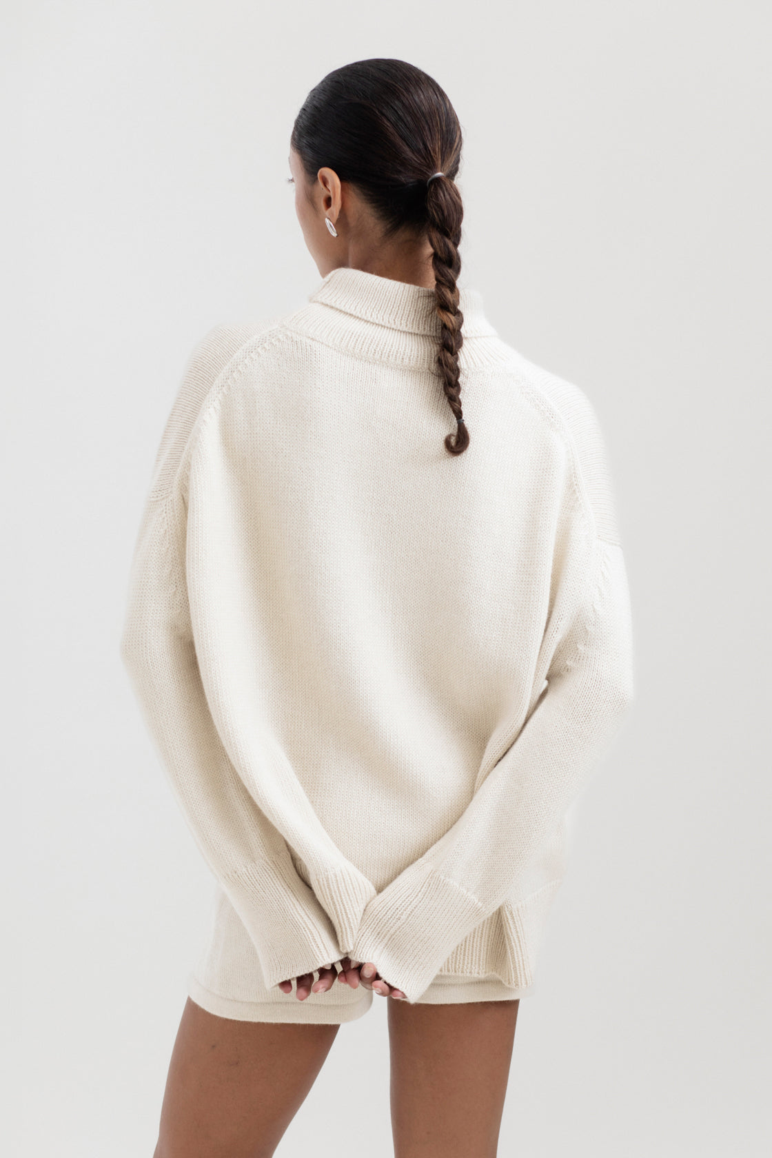Cedar Sweater in Cream, oversized baby alpaca turtleneck sweater by Ahblo, worn by model