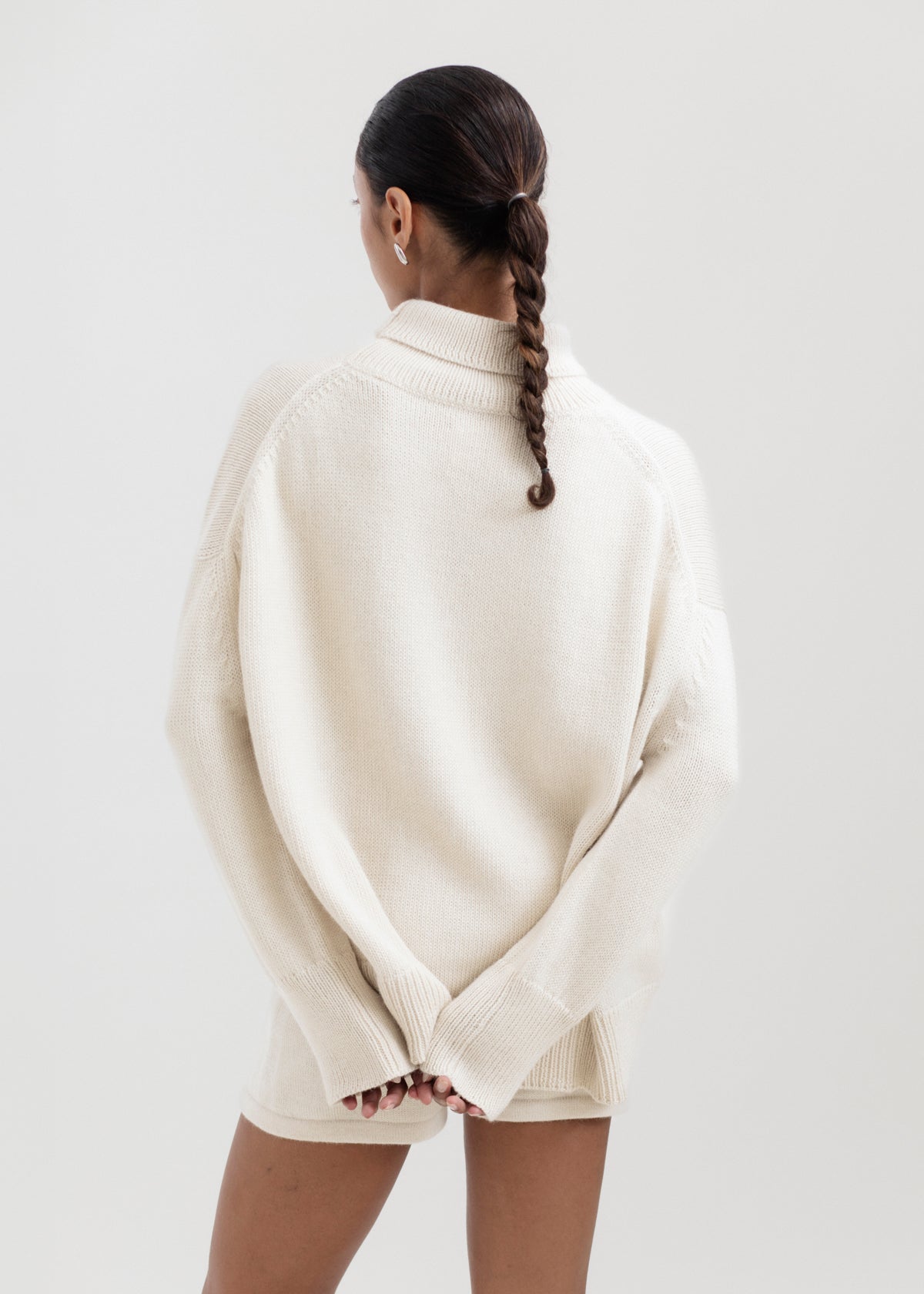 Cedar Sweater in Cream, oversized baby alpaca turtleneck sweater by Ahblo, worn by model
