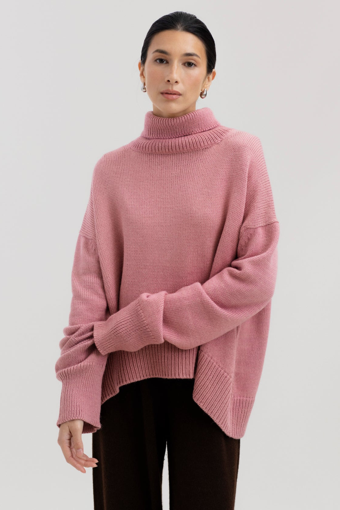 Cedar Sweater in Soft Blush, oversized baby alpaca turtleneck sweater by Ahblo, worn by model