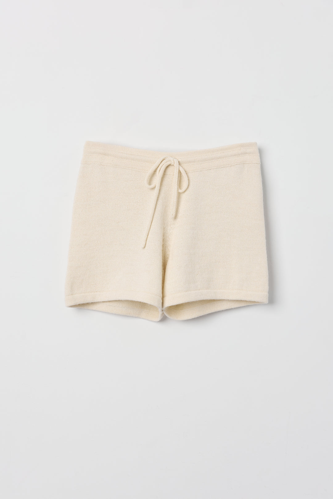Cove Shorts in Cream, baby alpaca knit shorts by Ahblo, flat lay