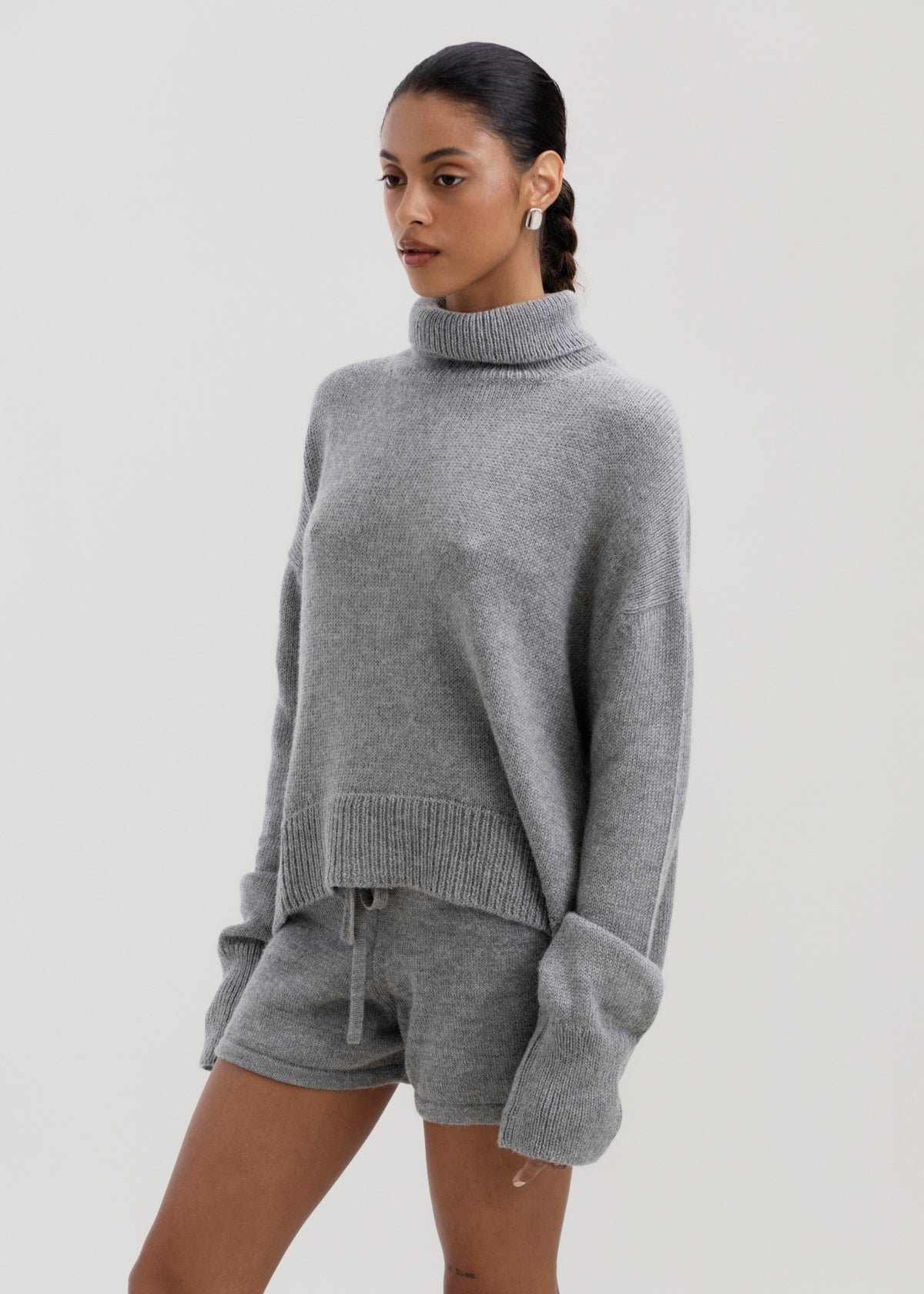 Cove Shorts in Mist Grey, baby alpaca knit shorts by Ahblo, worn by model
