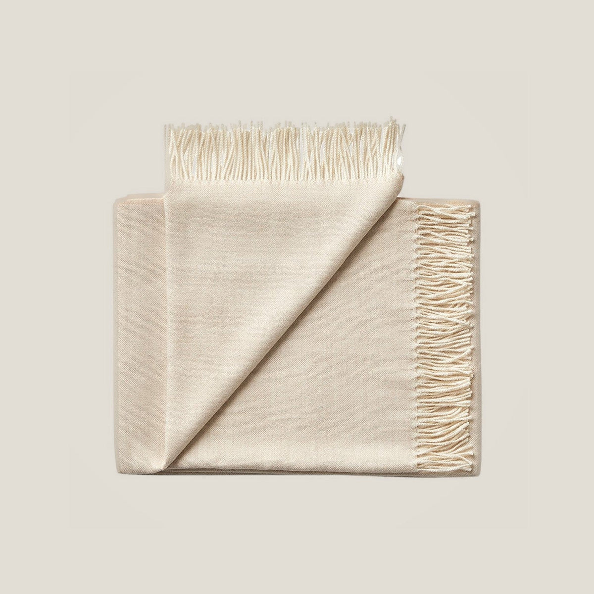 Elia Throw in Cream, baby alpaca throw blanket by Ahblo, flat lay