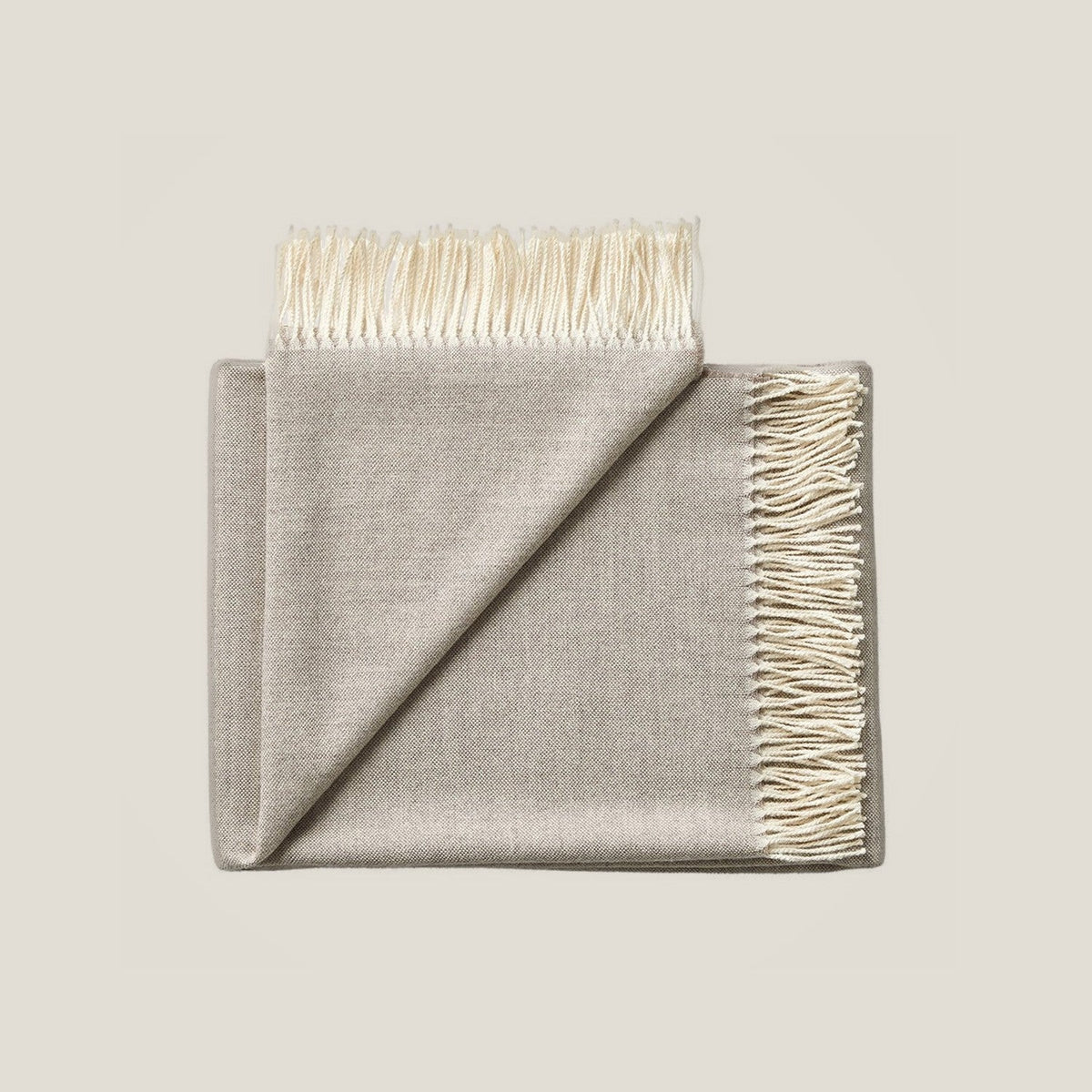 Elia Throw in Dune, baby alpaca throw blanket by Ahblo, flat lay