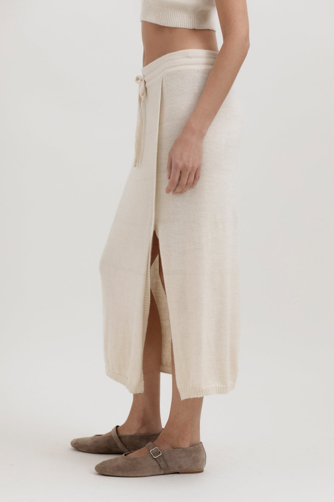 Elise Midi Skirt in Cream, alpaca knit midi skirt by Ahblo, worn by model