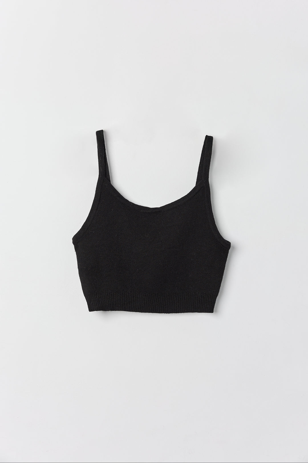 Halo Top in Black, alpaca knit cropped top by Ahblo, flat lay