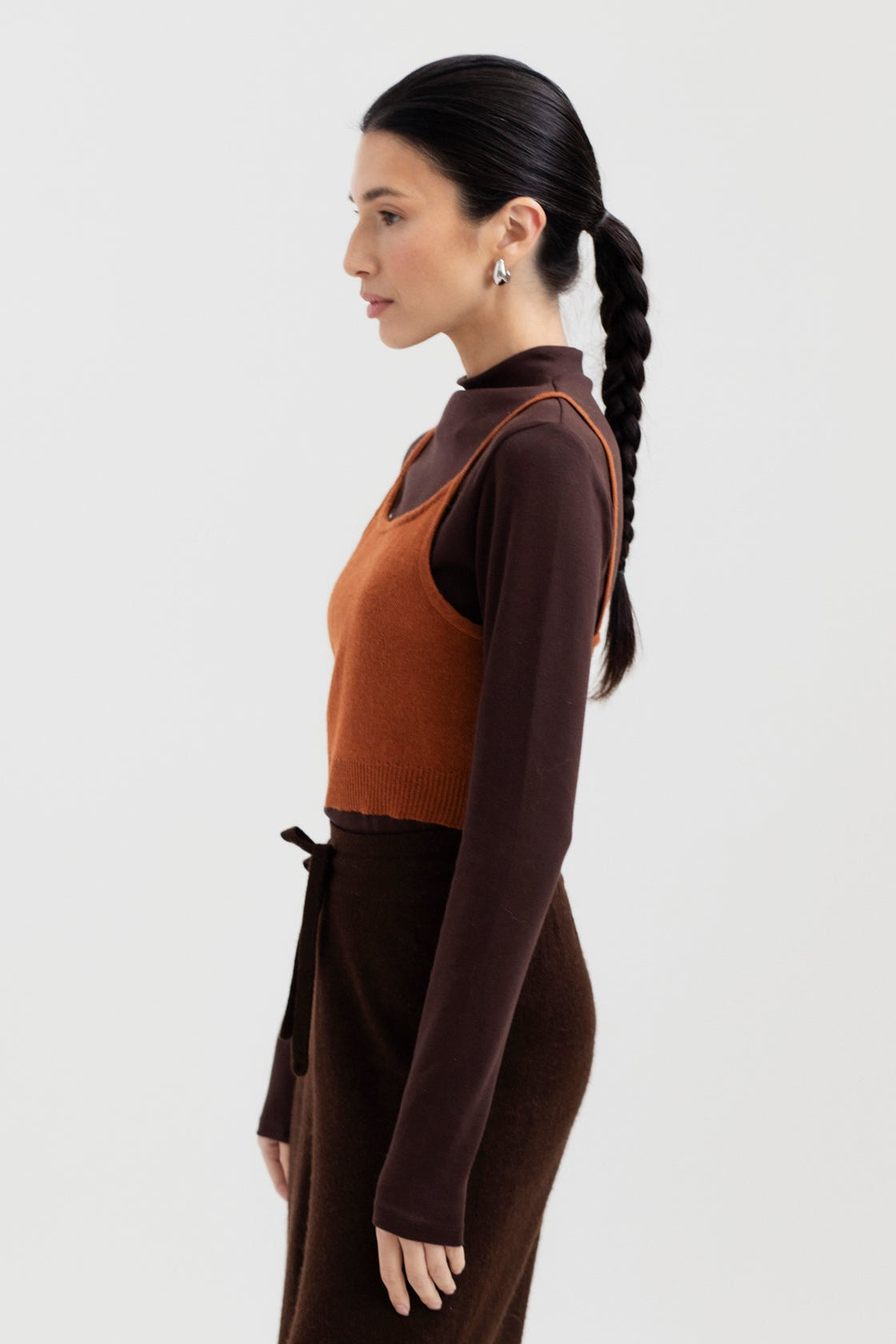 Halo Top in Burnt Orange, alpaca knit cropped top by Ahblo, worn by model