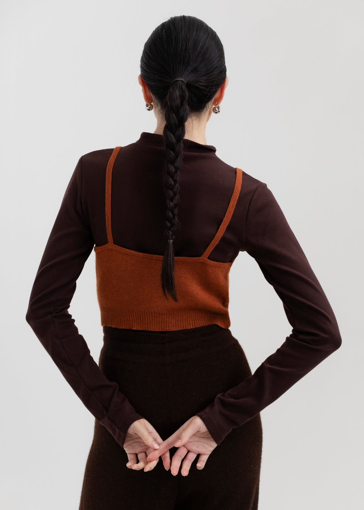Halo Top in Burnt Orange, alpaca knit cropped top by Ahblo, worn by model