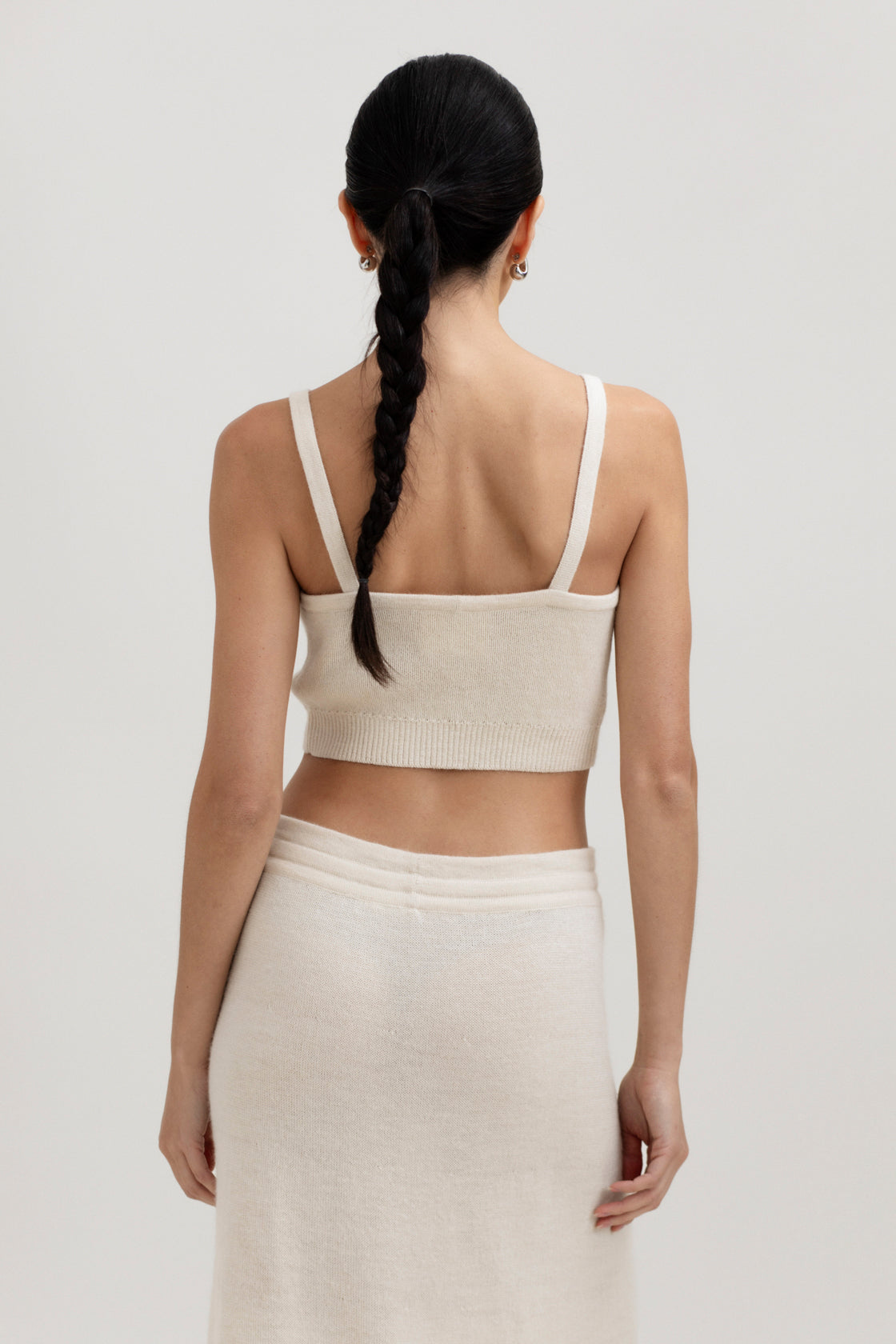 Halo Top in Cream, alpaca knit cropped top by Ahblo, worn by model