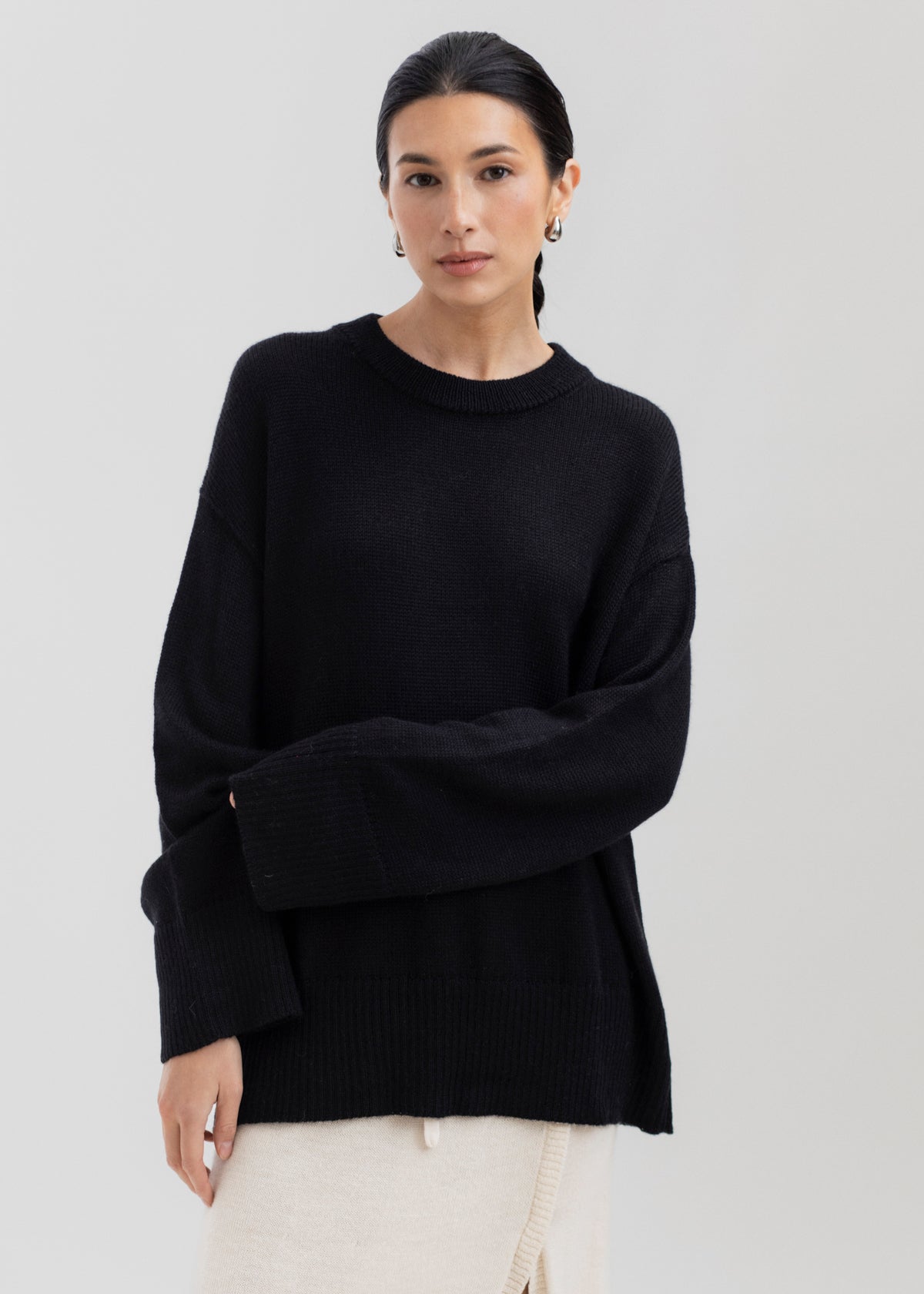 Haven Crew in Black, baby alpaca crew-neck sweater by Ahblo, worn by model