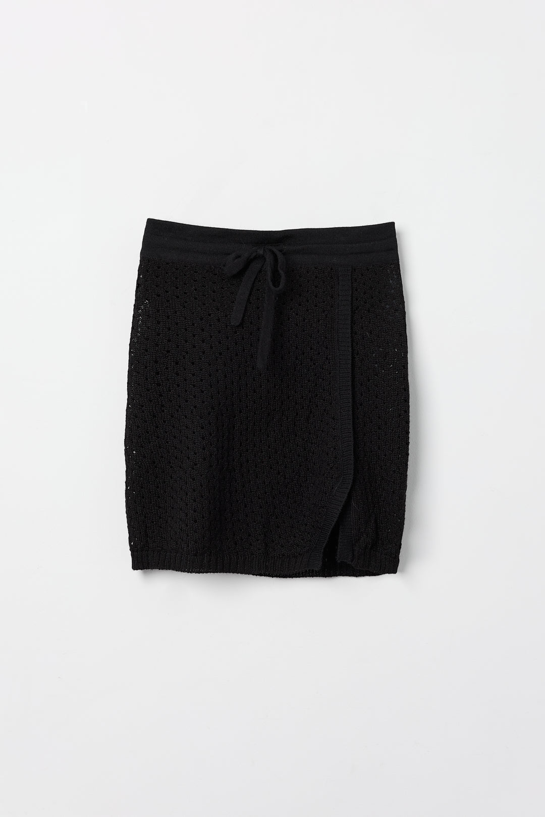 Lani Mini Skirt in Black, baby alpaca knit mini skirt by Ahblo, flat lay