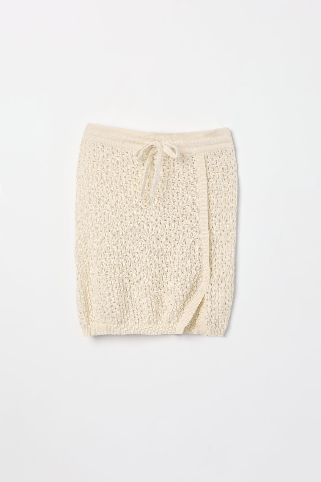 Lani Mini Skirt in Cream, baby alpaca knit mini skirt by Ahblo, flat lay