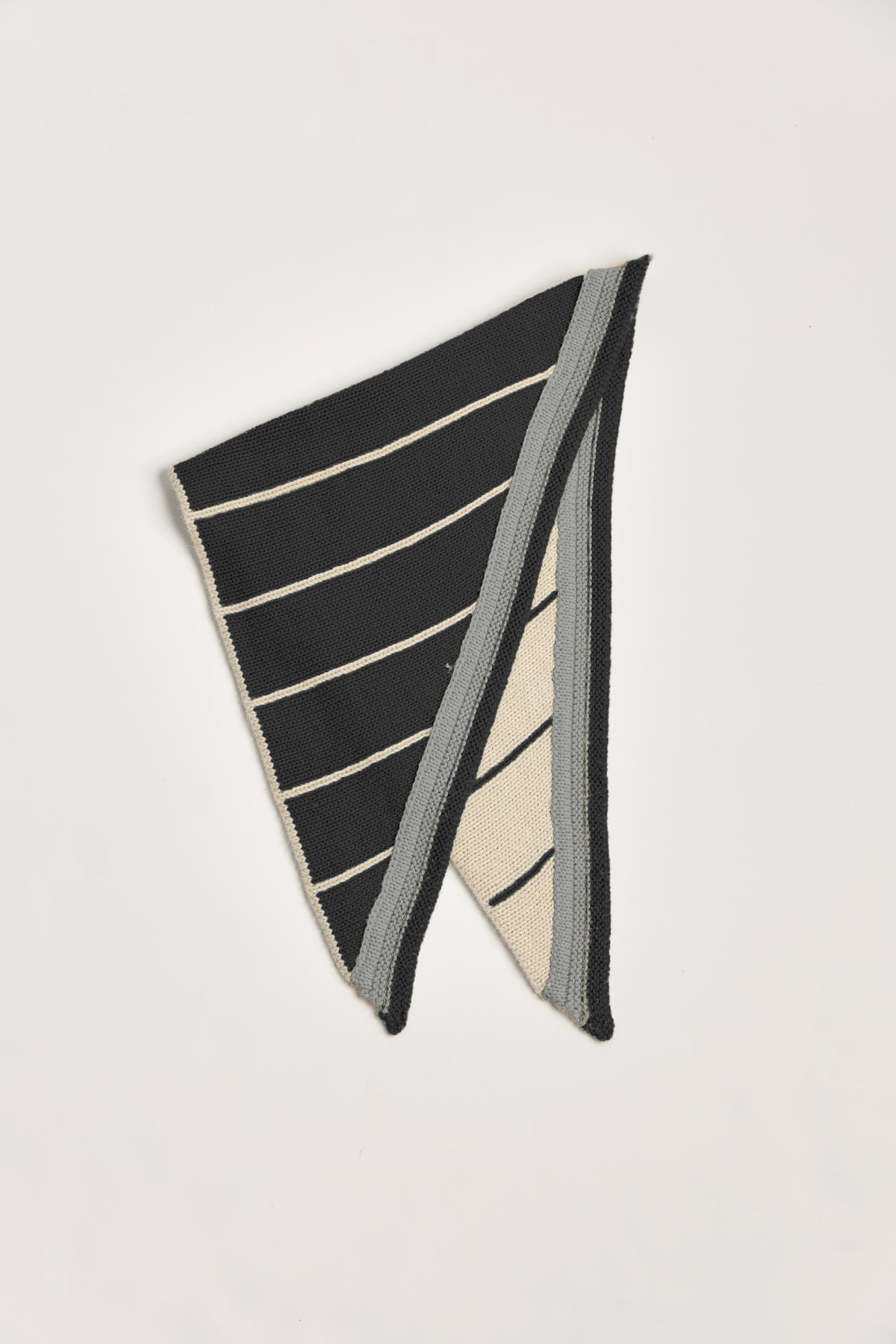 Lina Scarf in Grey, reversible striped baby alpaca triangle scarf by Ahblo, flat lay