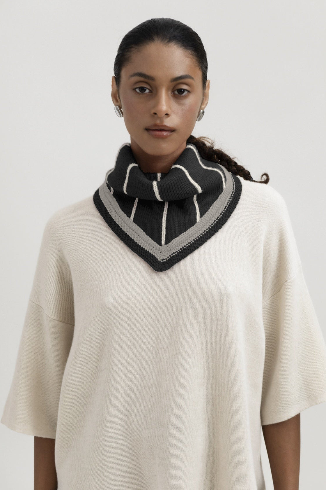 Lina Scarf in Grey, reversible striped baby alpaca triangle scarf by Ahblo, worn by model