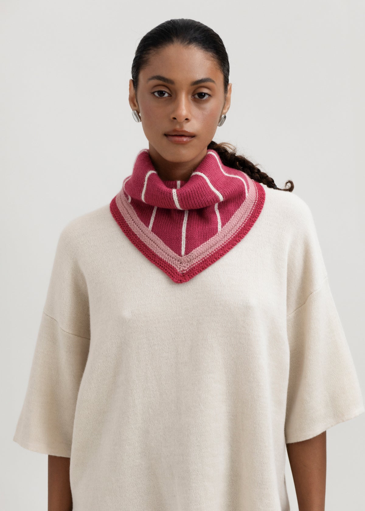 Lina Scarf in Wild Rose, reversible striped baby alpaca triangle scarf by Ahblo, worn by model