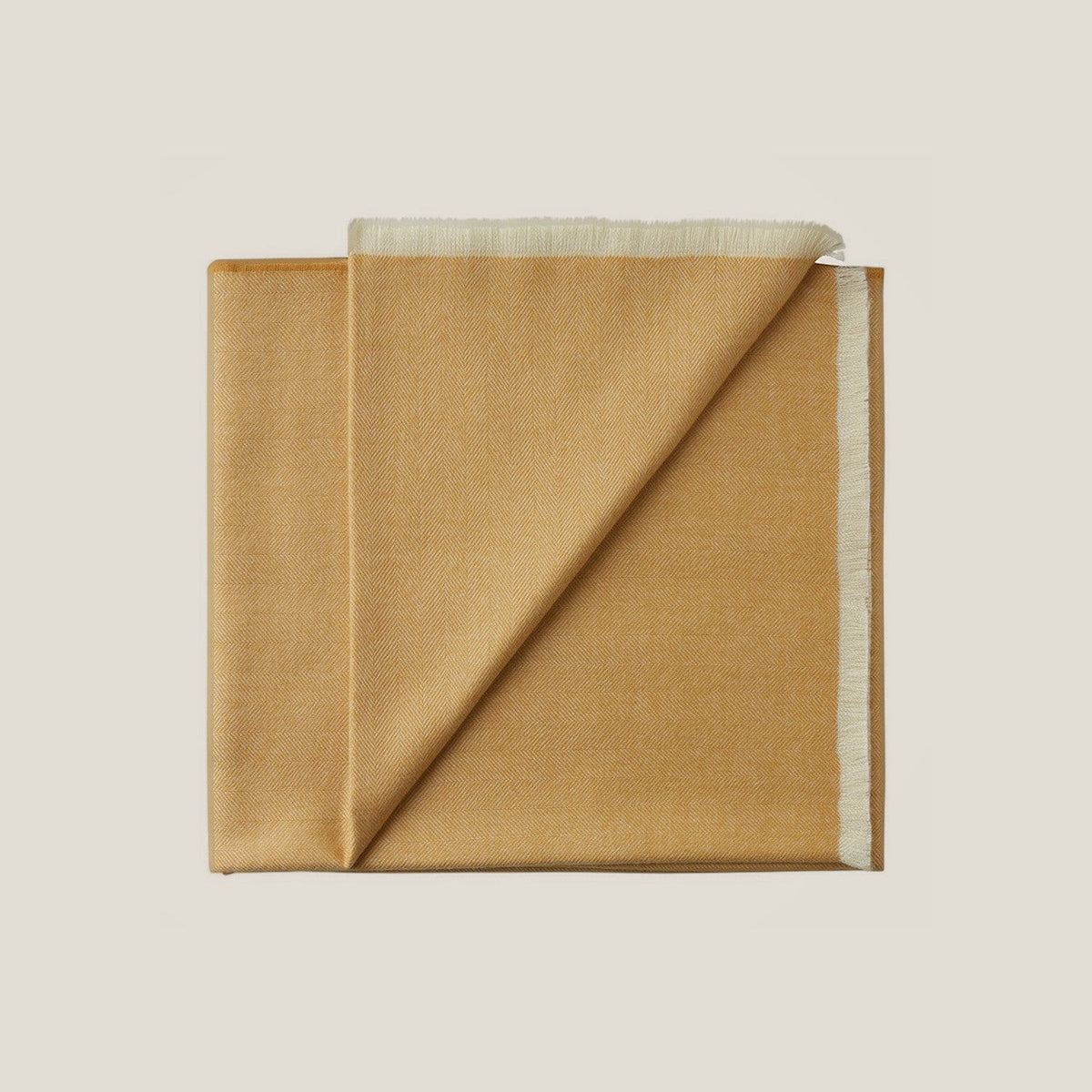Liora Throw in Sun Stone, baby alpaca herringbone throw blanket by Ahblo, flat lay