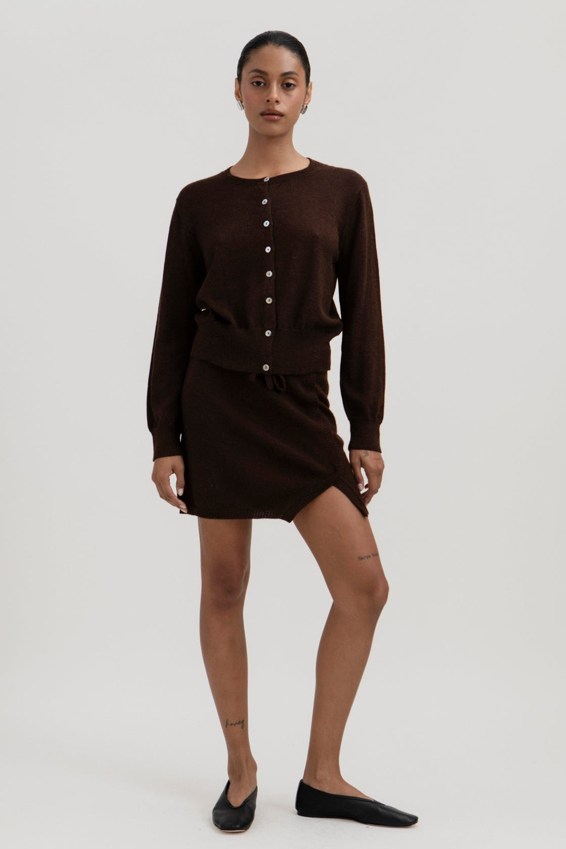 Lisa Mini Skirt in Chocolate Brown, baby alpaca jersey mini skirt by Ahblo, worn by model