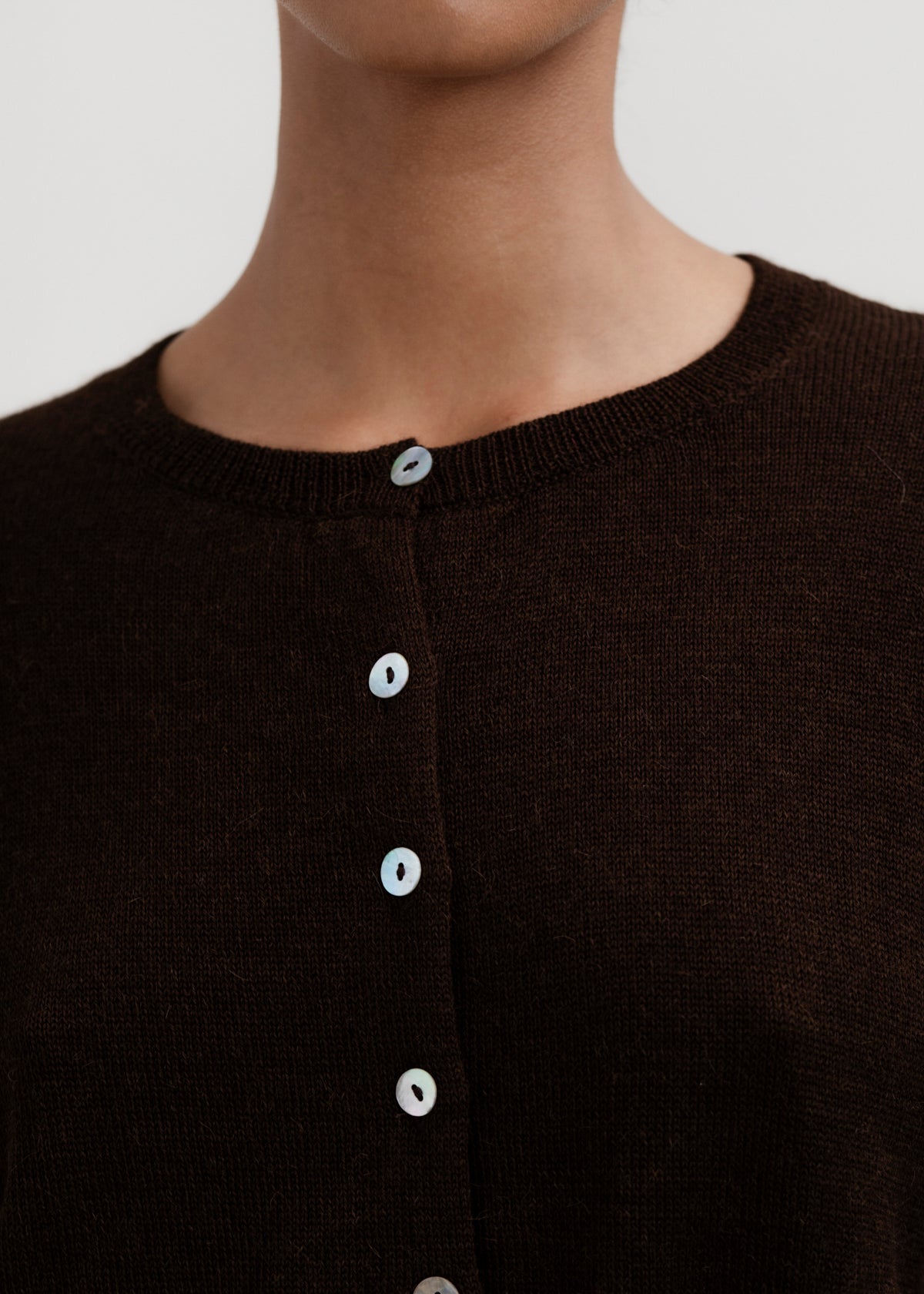 Lulu Cardigan in Chocolate Brown, alpaca cardigan by Ahblo, worn by model