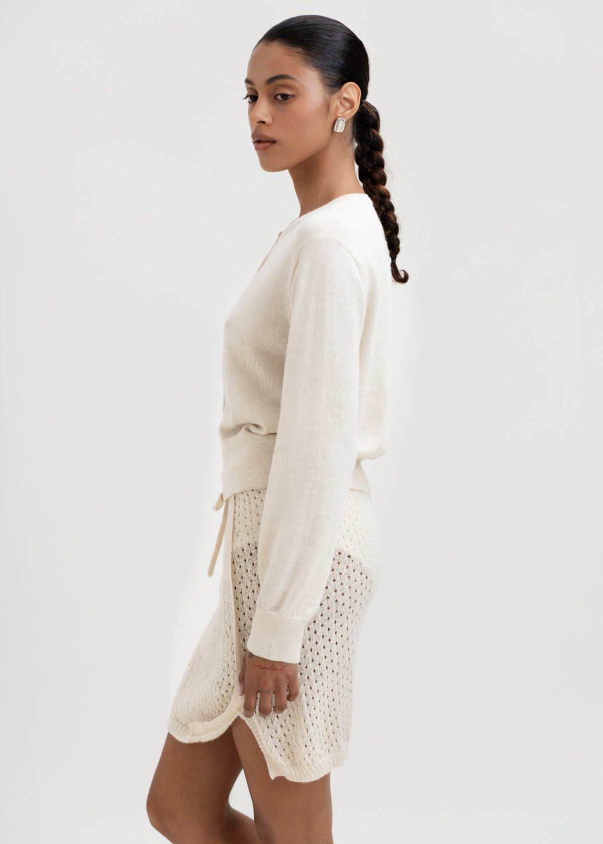 Lulu Cardigan in Cream, alpaca cardigan by Ahblo, worn by model