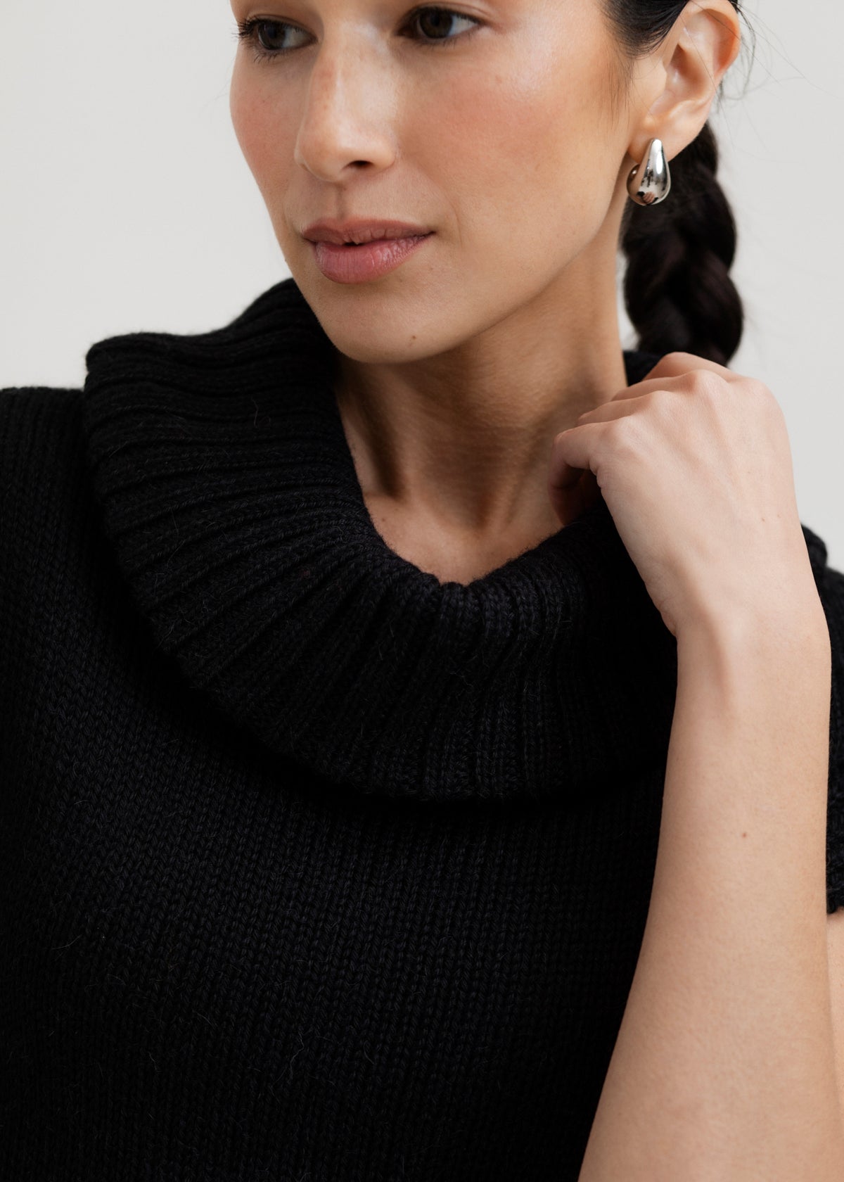 Luna Top in Black, baby alpaca knit top by Ahblo, worn by model