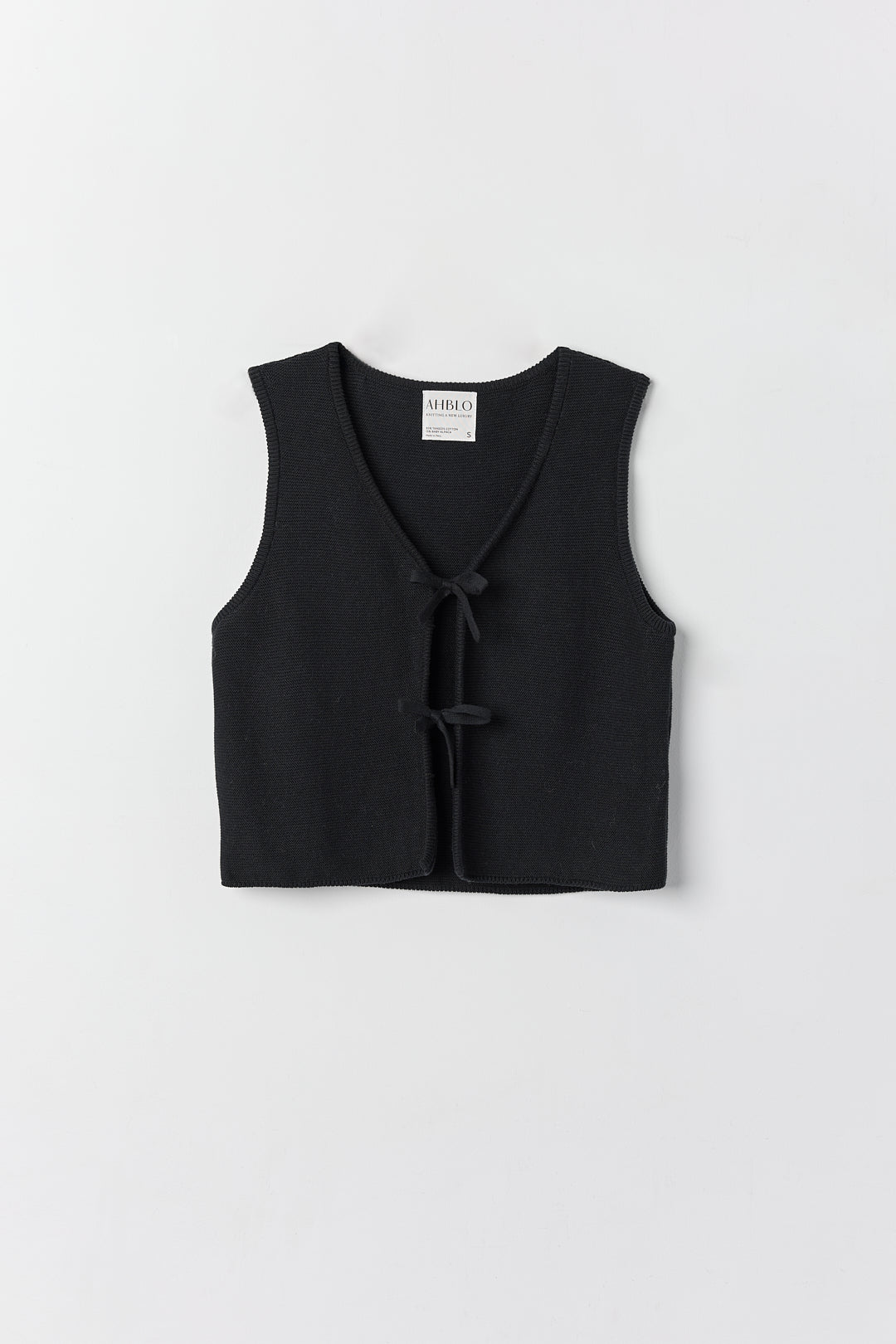Luzia Vest in Black, cotton and baby alpaca knit vest by Ahblo, flat lay