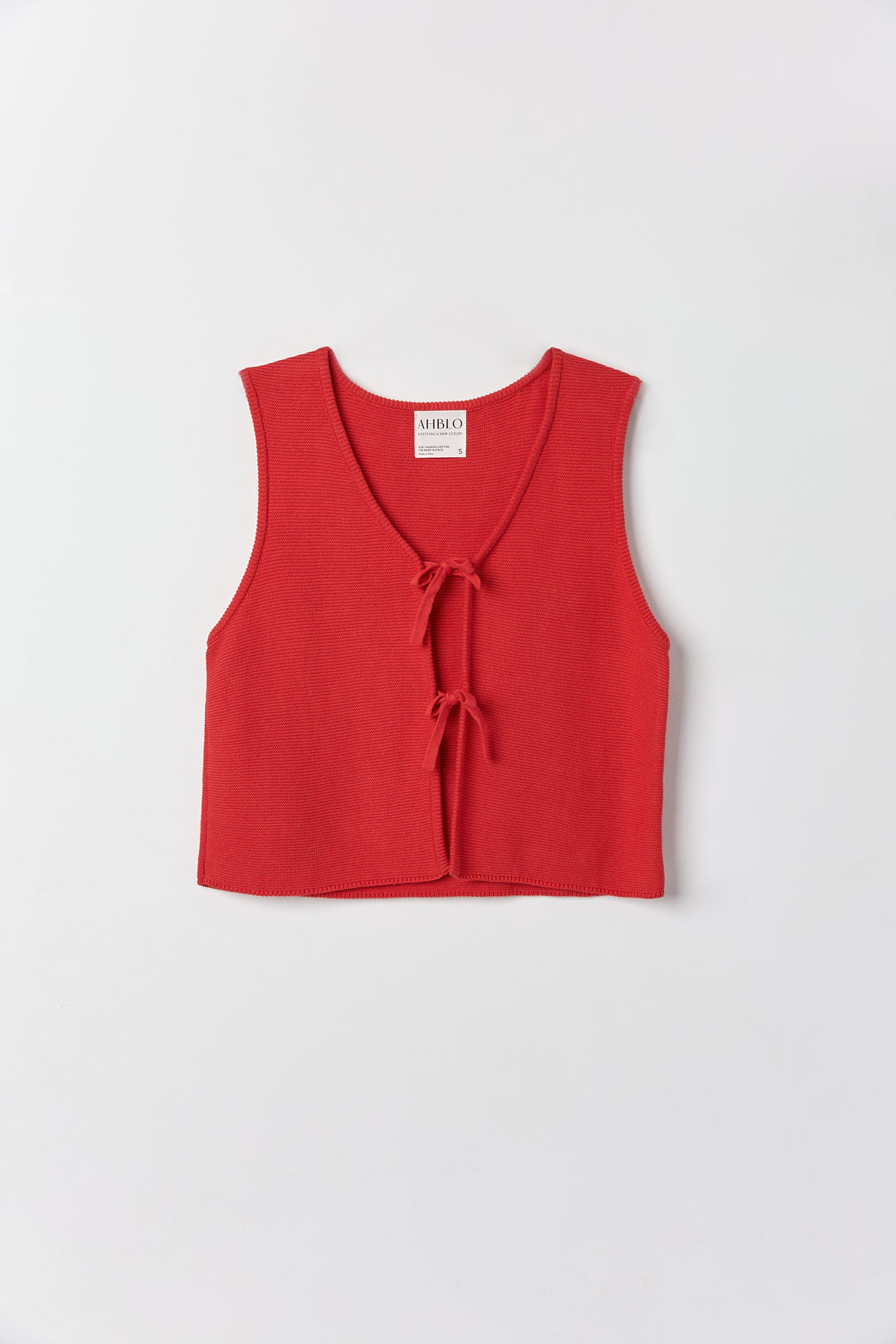Luzia Vest in Cerise, cotton and baby alpaca knit vest by Ahblo, flat lay