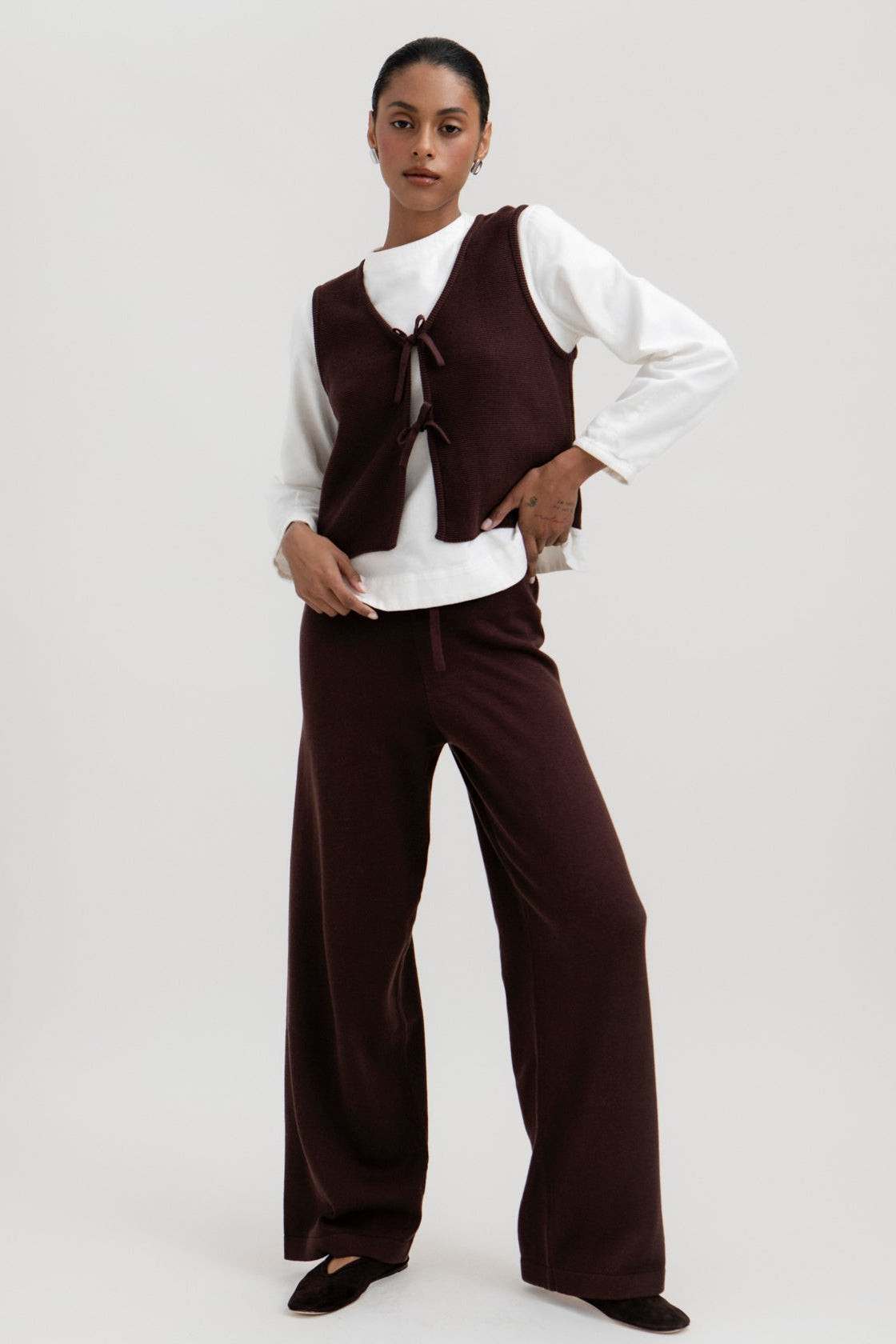 Luzia Vest in Chocolate Brown, cotton and baby alpaca knit vest by Ahblo, worn by model