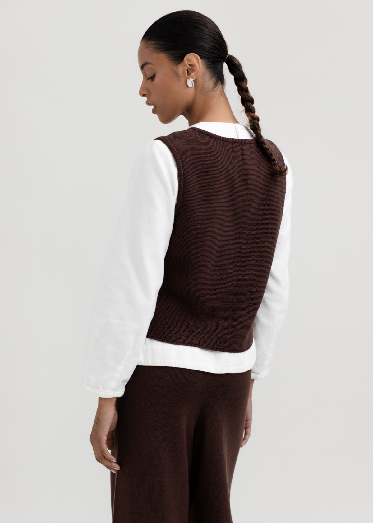 Luzia Vest in Chocolate Brown, cotton and baby alpaca knit vest by Ahblo, worn by model