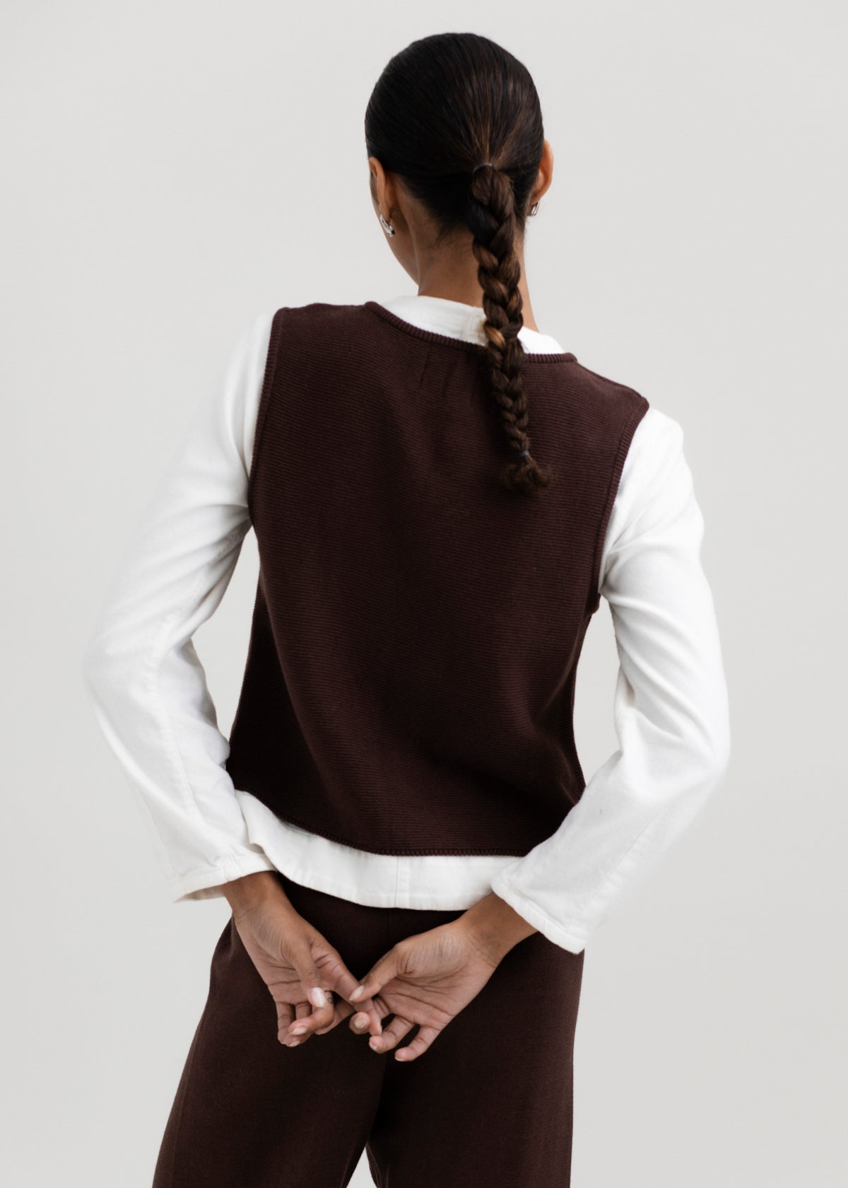 Luzia Vest in Chocolate Brown, cotton and baby alpaca knit vest by Ahblo, worn by model
