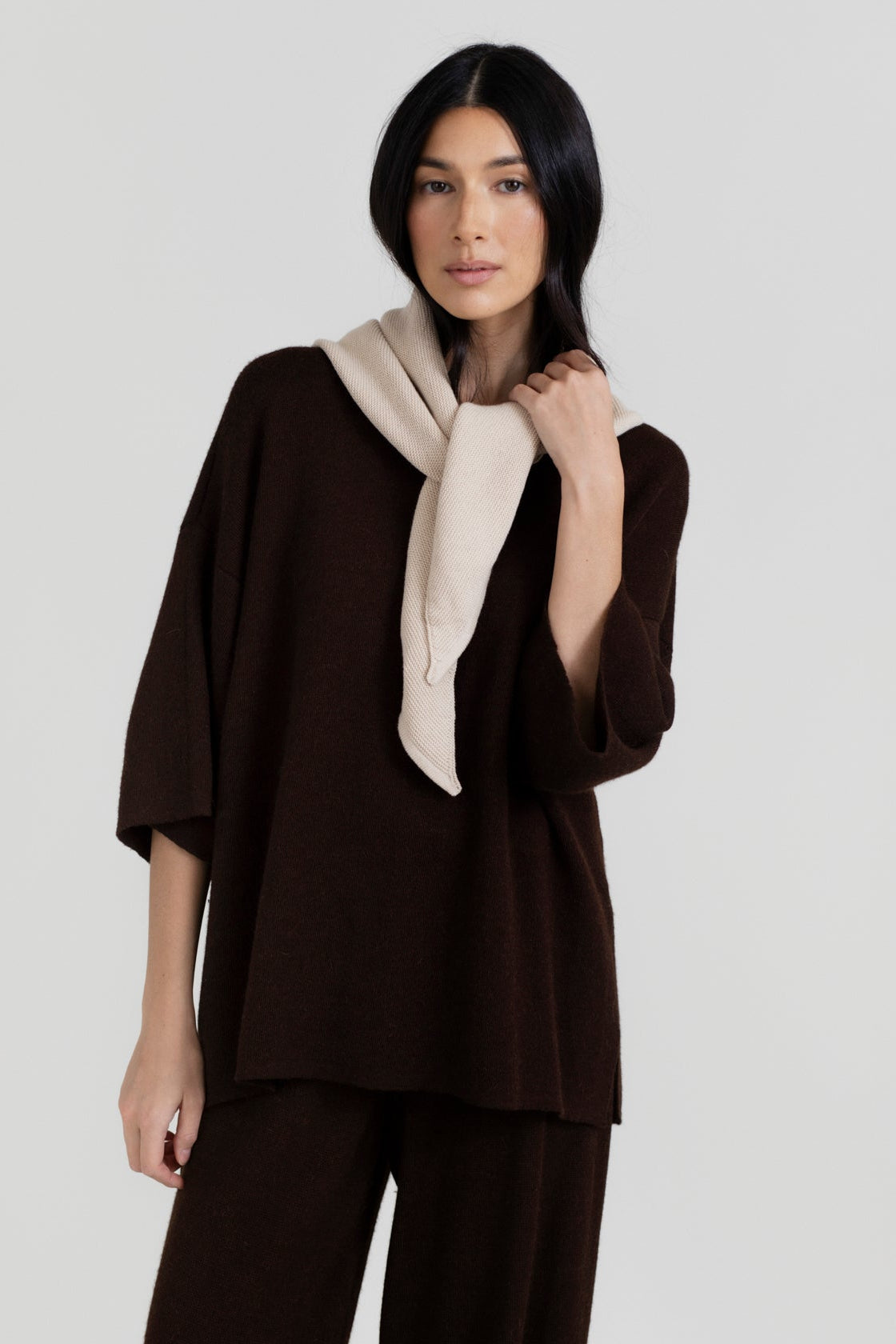 Nora Scarf in Praline, cotton and baby alpaca triangle scarf by Ahblo, worn by model
