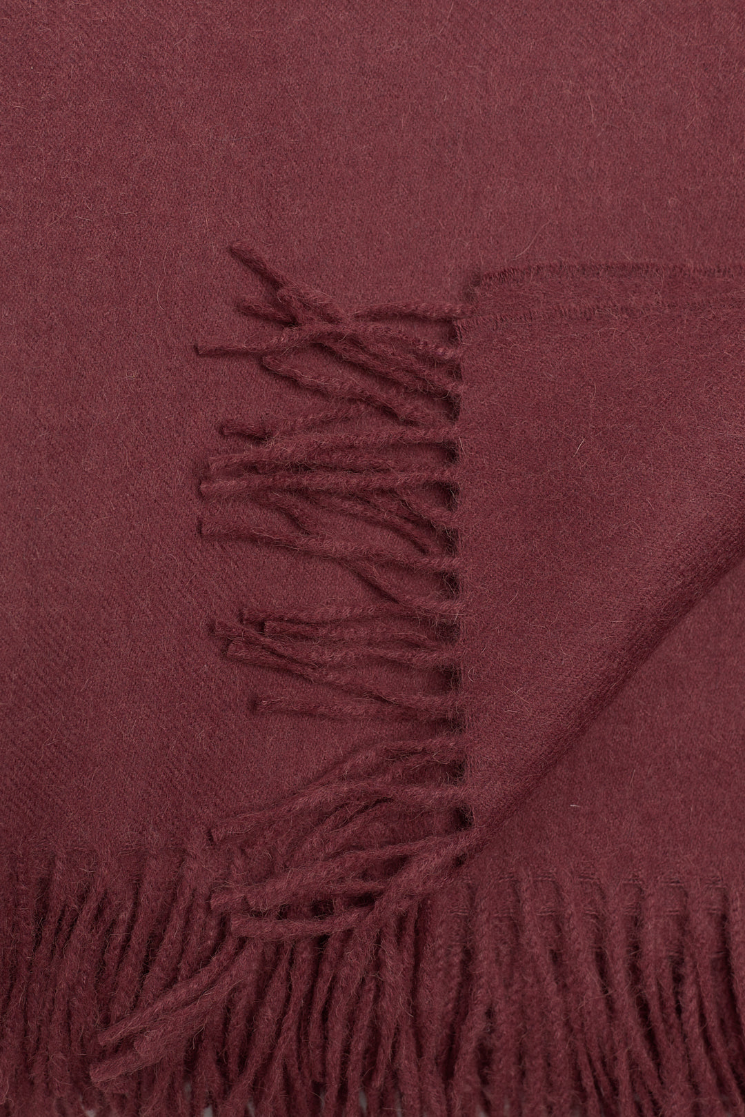 Rowan Scarf in Burgundy, fringed baby alpaca scarf by Ahblo, flat lay