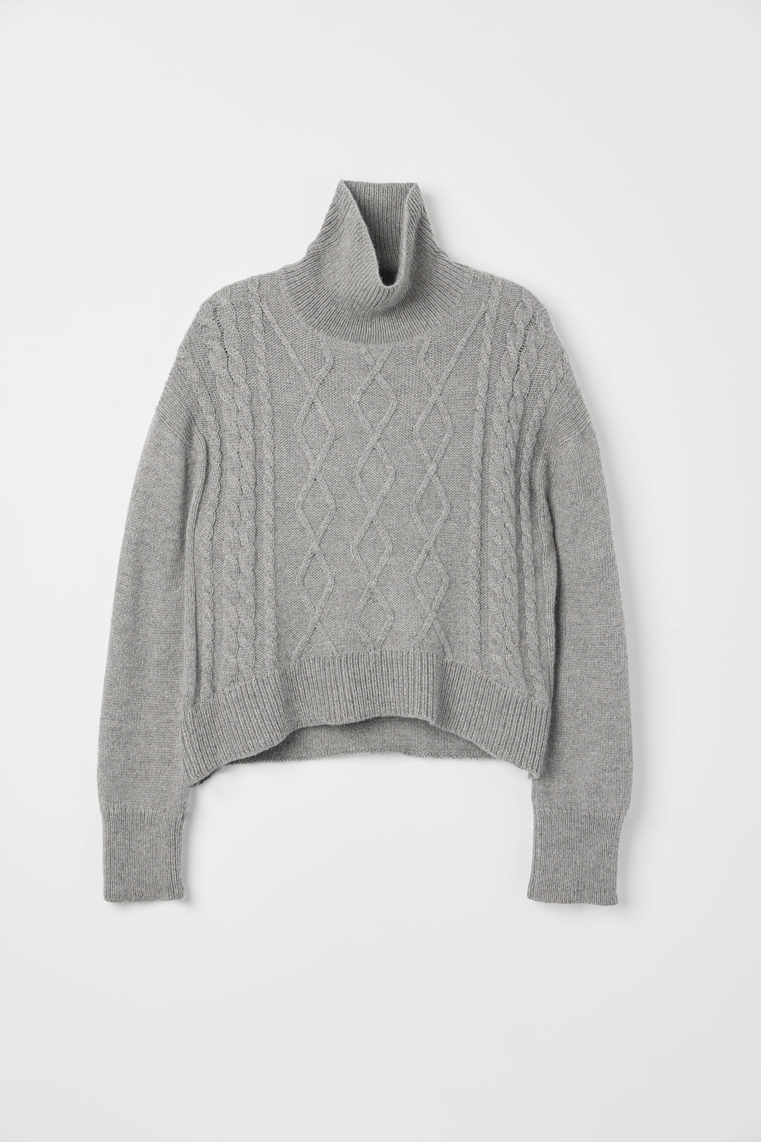Sierra Cable Knit in Mist Grey, oversized baby alpaca cable-knit sweater by Ahblo, flat lay