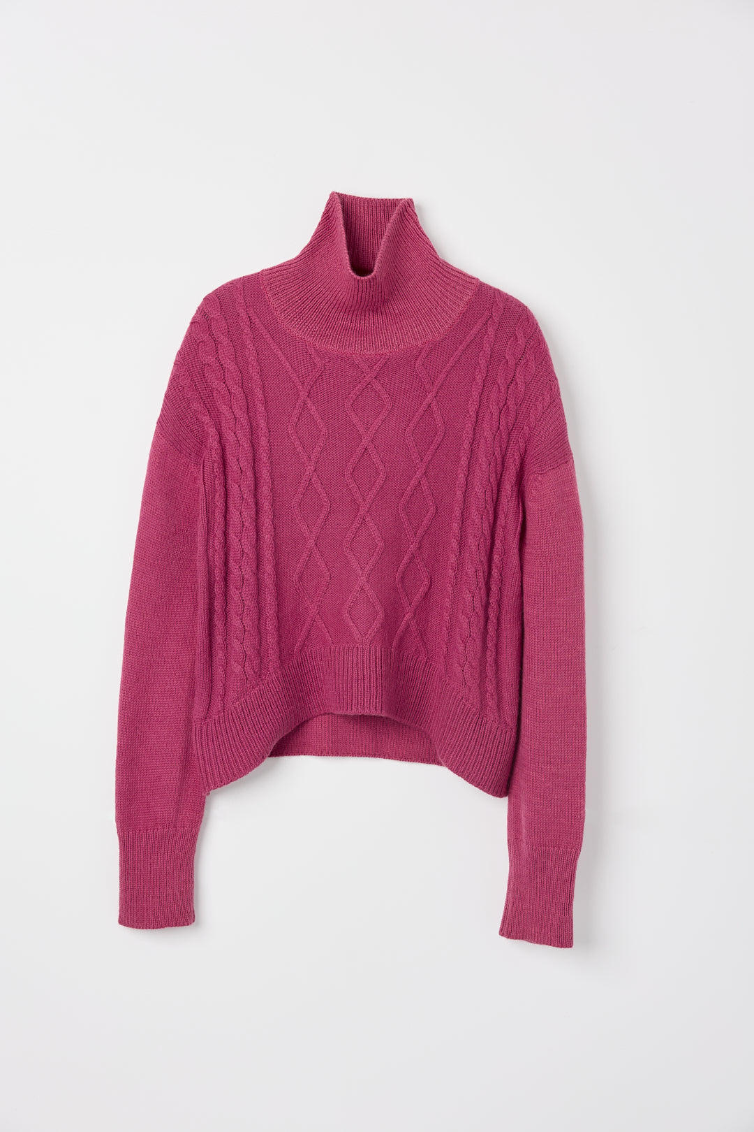 Sierra Cable Knit in Wild Pink, oversized baby alpaca cable-knit sweater by Ahblo, flat lay