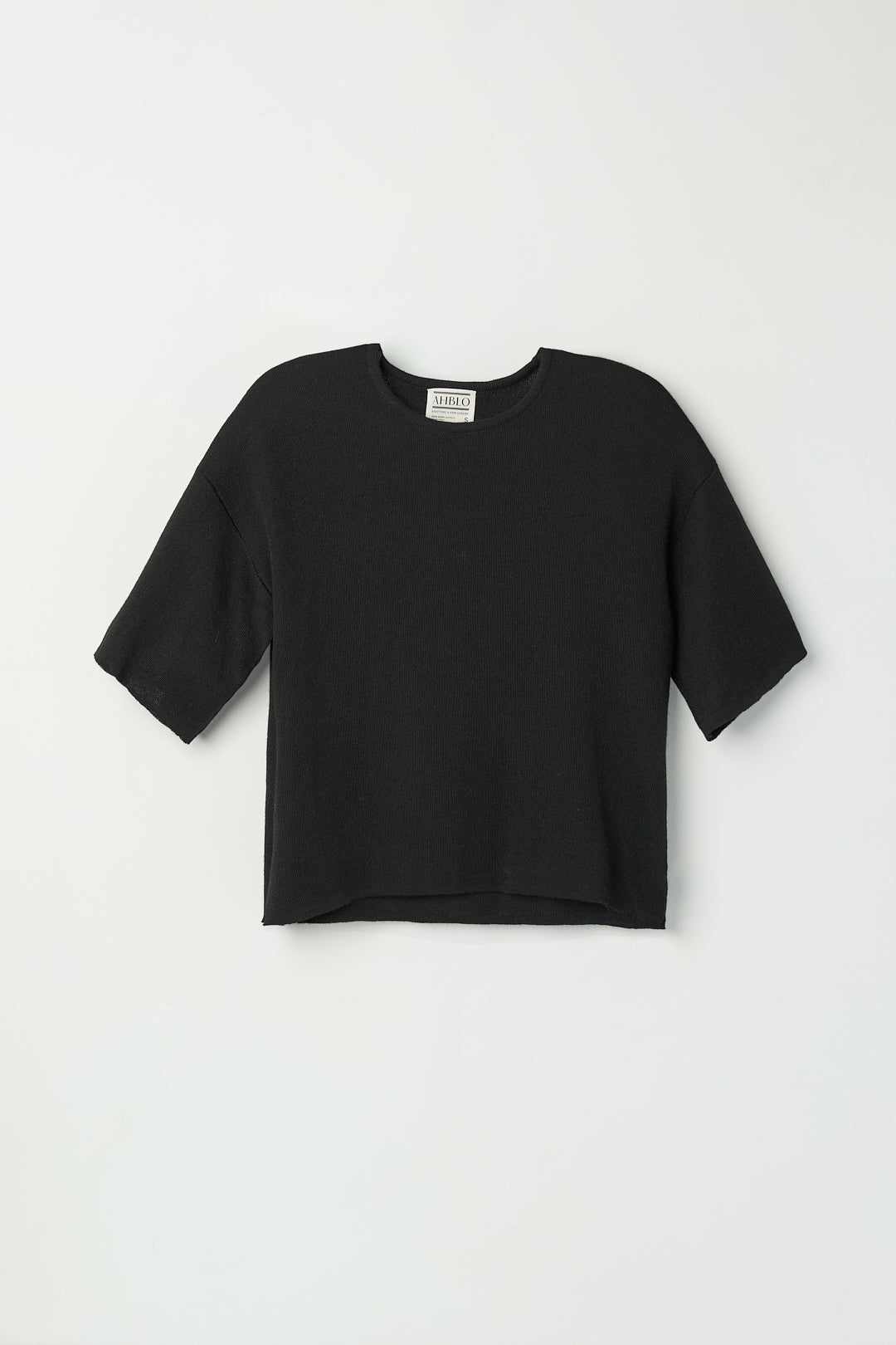 Solace Tee Sweater in Black, alpaca tee sweater by Ahblo, flat lay