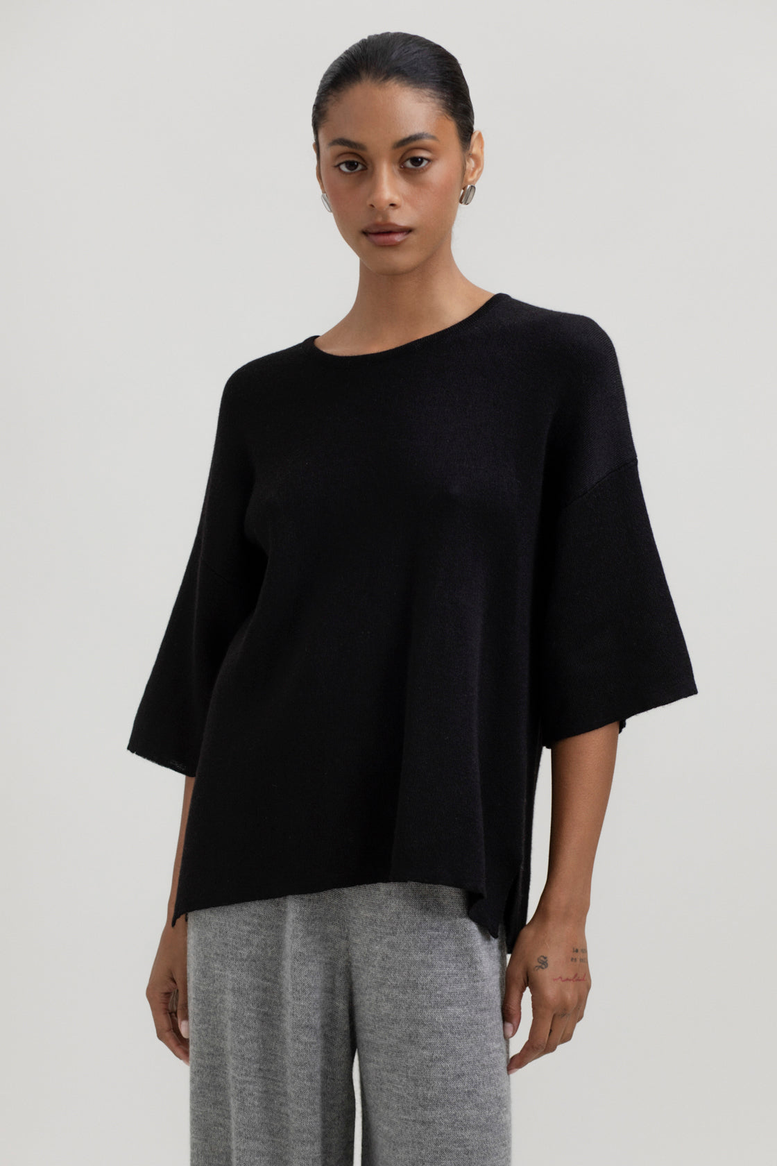Solace Tee Sweater in Black, alpaca tee sweater by Ahblo, worn by model