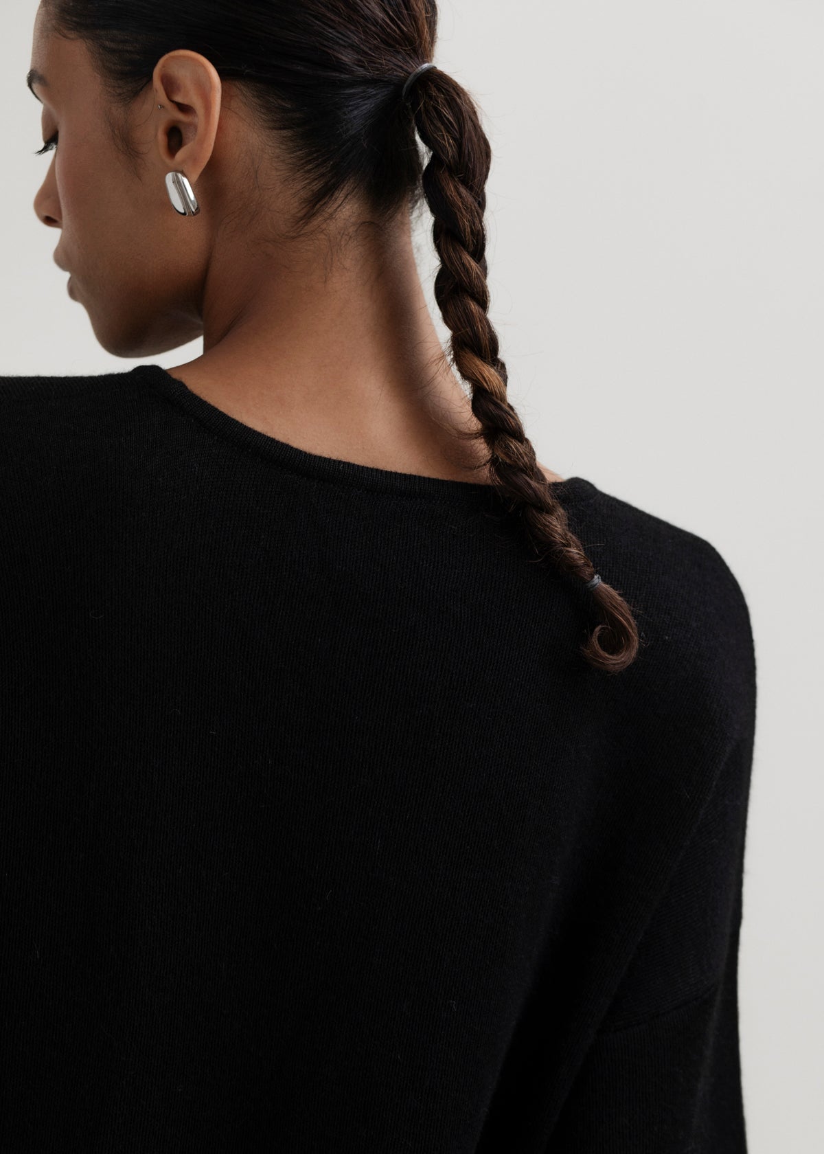 Solace Tee Sweater in Black, alpaca tee sweater by Ahblo, worn by model