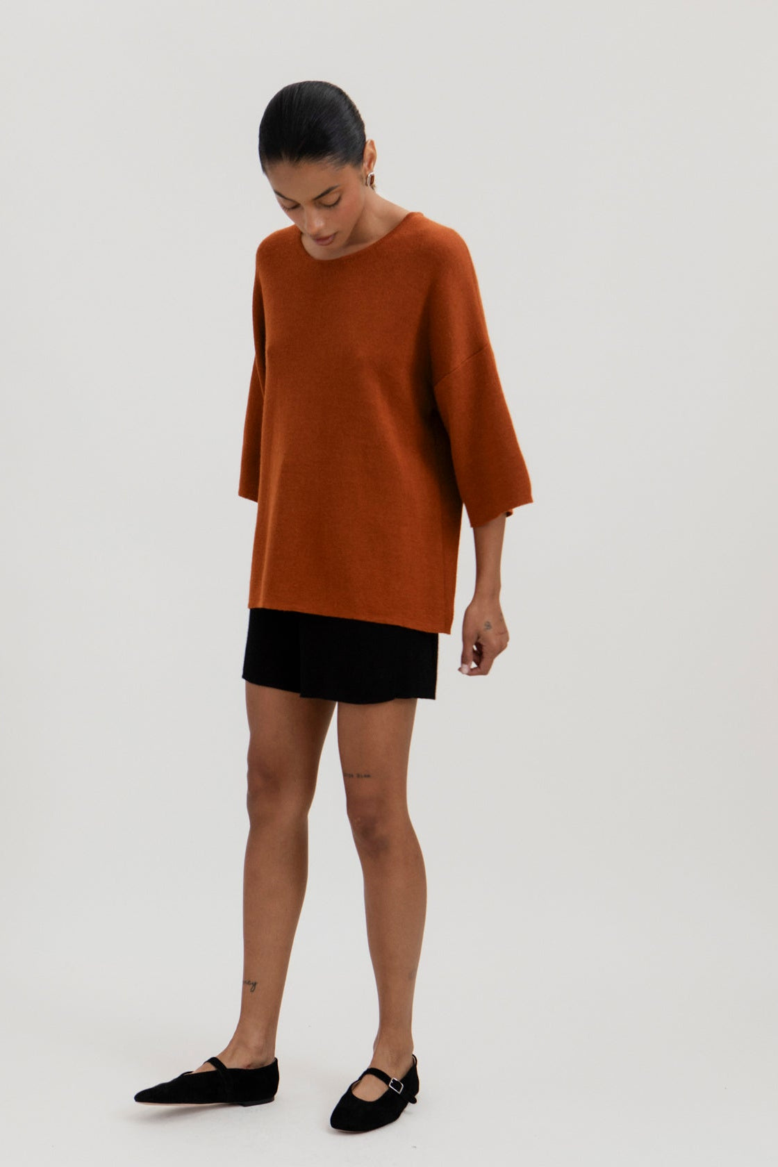 Solace Tee Sweater in Burnt Orange, alpaca tee sweater by Ahblo, worn by model